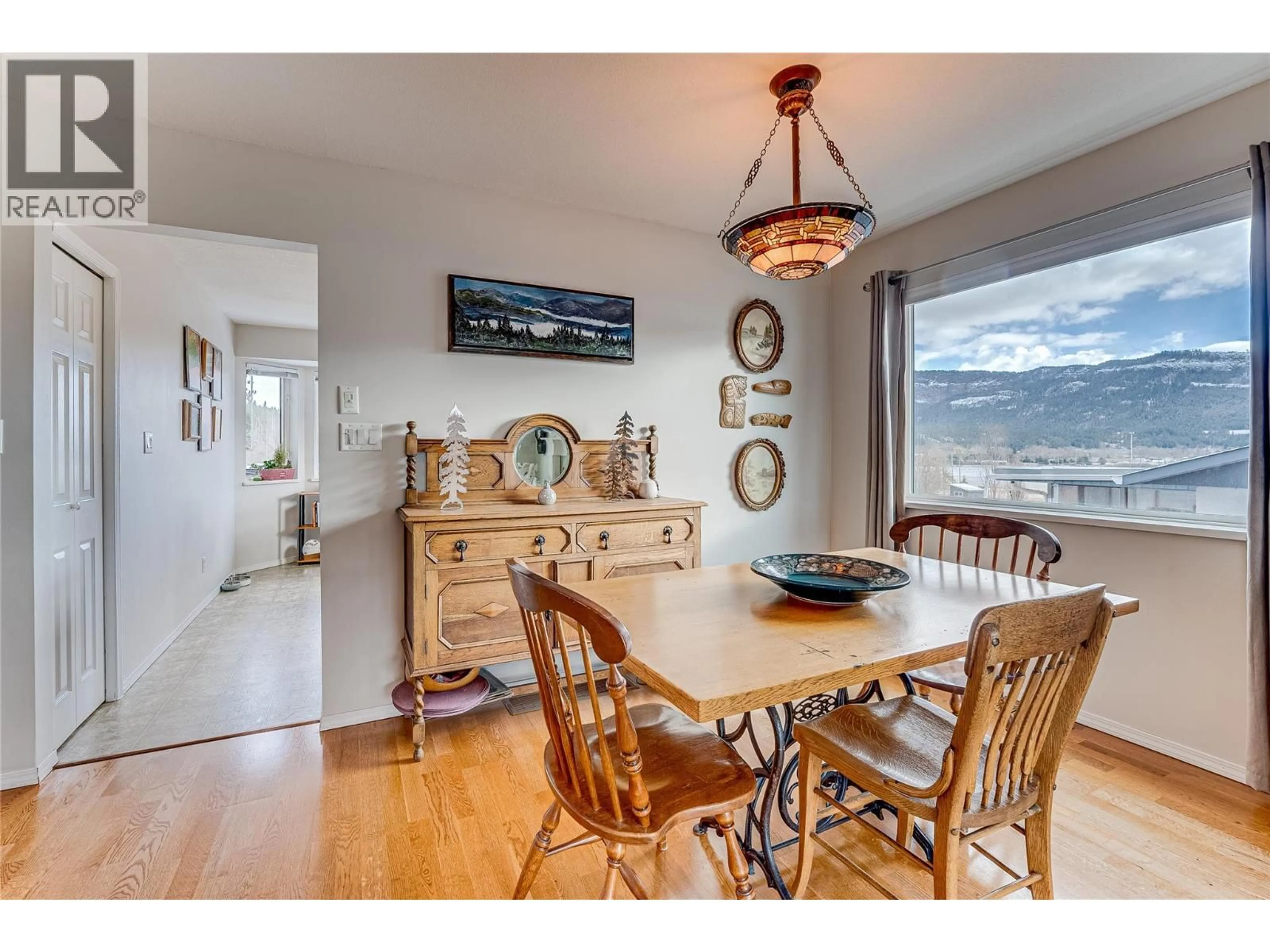 Dining room, wood/laminate floor for 1505 NORTHERN AVENUE, Enderby British Columbia V0E1V1