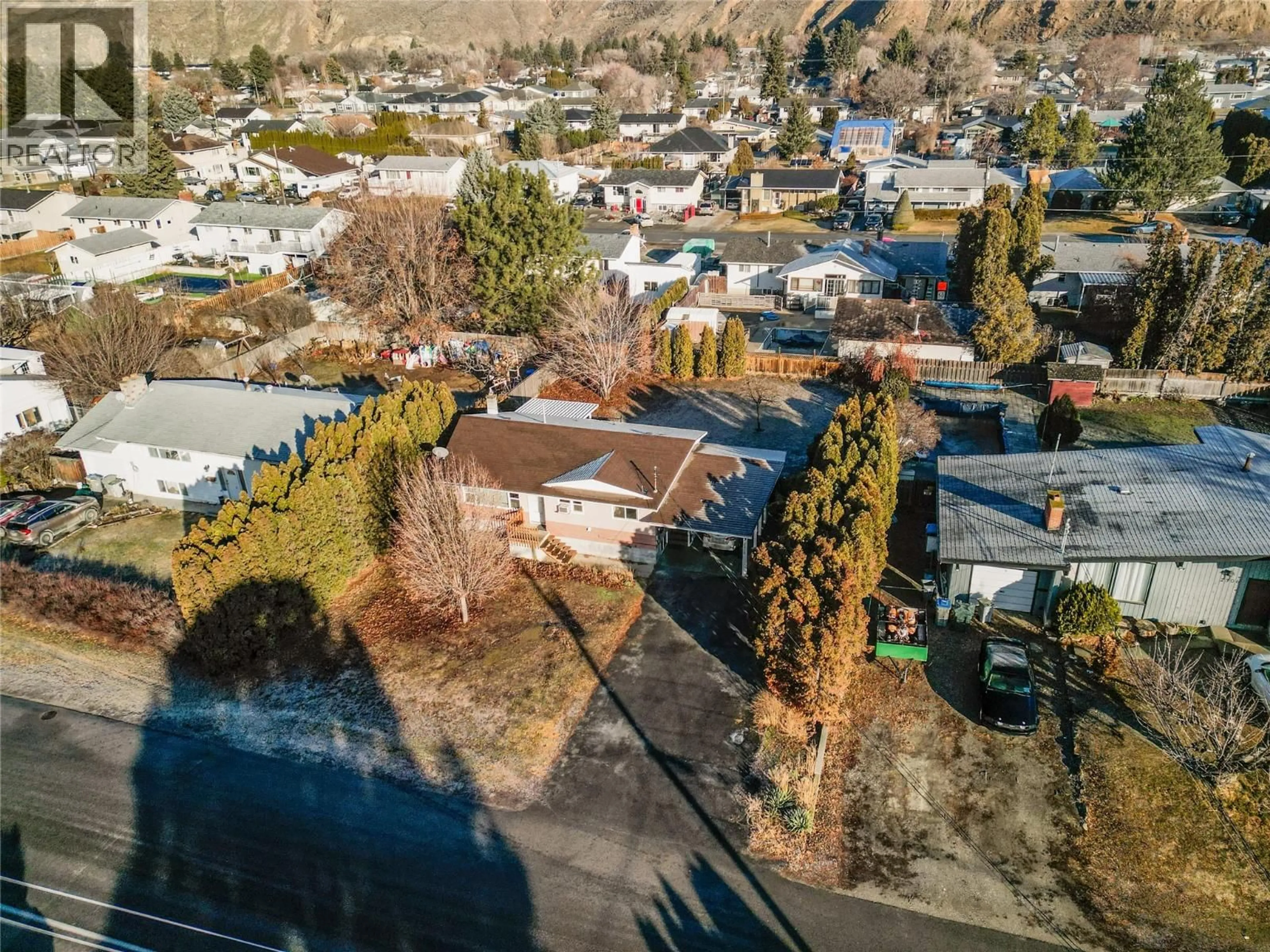 A pic from outside/outdoor area/front of a property/back of a property/a pic from drone, mountain view for 2310 GREENFIELD AVENUE, Kamloops British Columbia V2B4P4