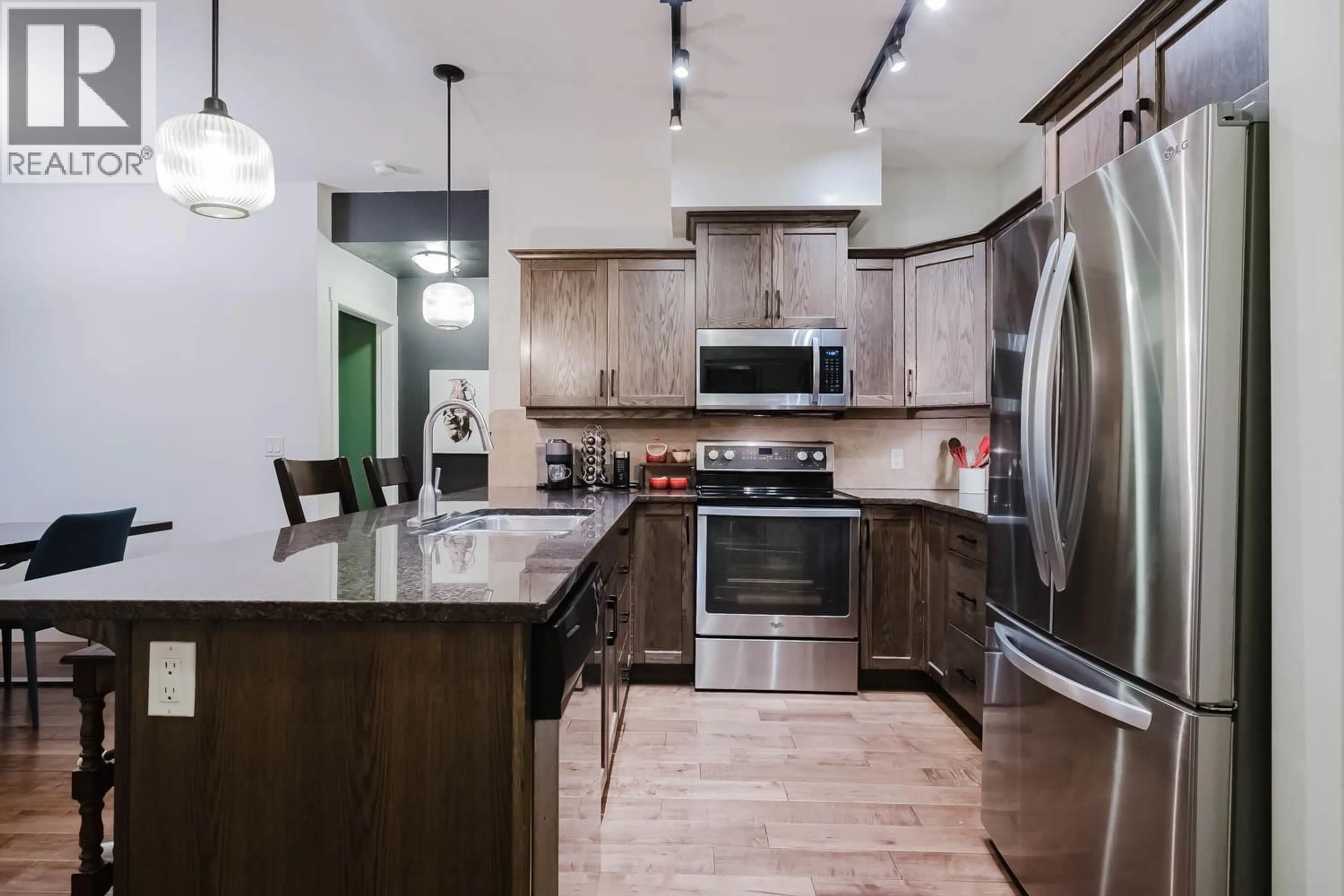 Open concept kitchen, unknown for 112 - 3739 CASORSO ROAD, Kelowna British Columbia V1W5E8