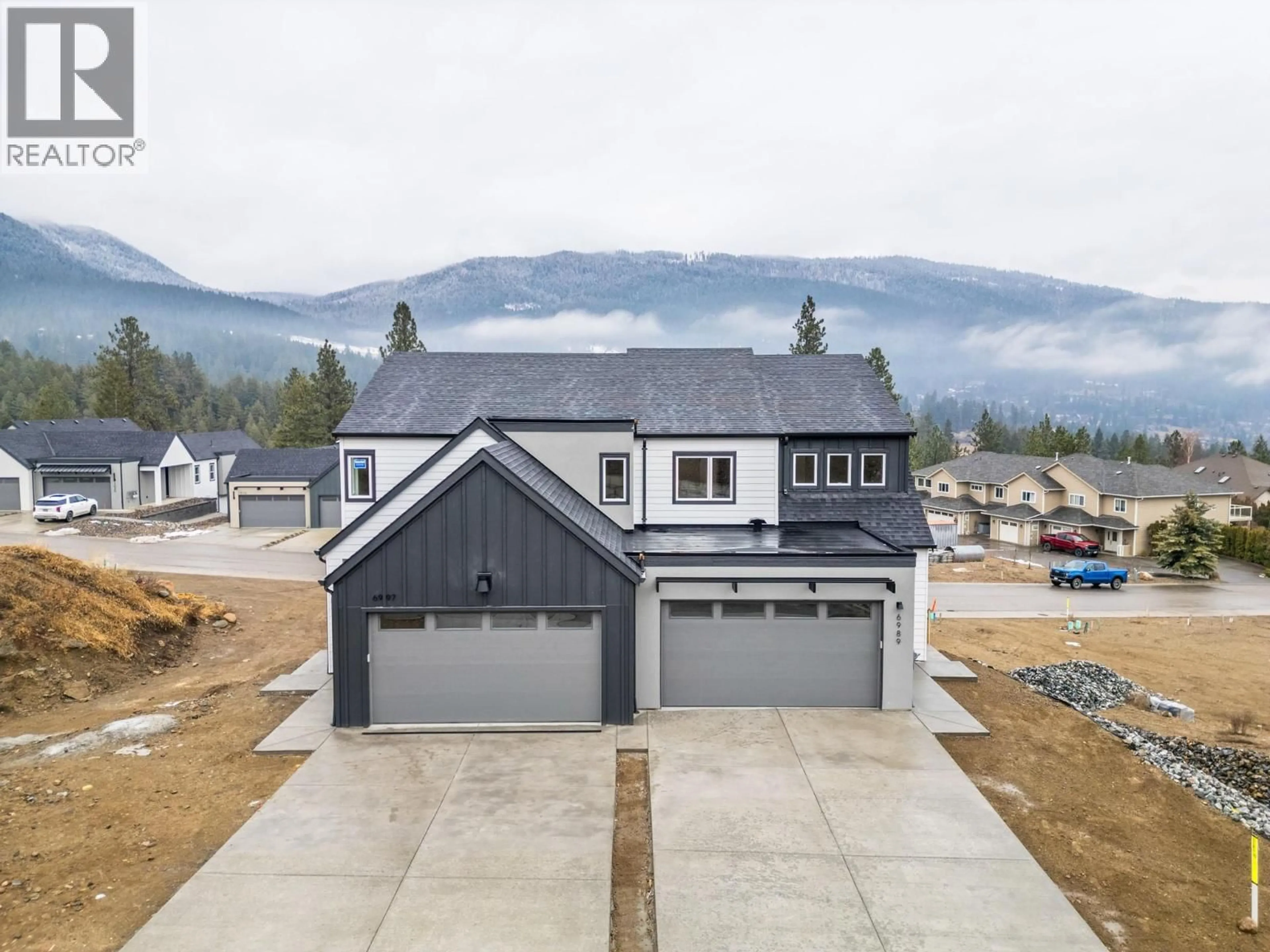 A pic from outside/outdoor area/front of a property/back of a property/a pic from drone, mountain view for 7005 MANNING PLACE, Vernon British Columbia V1B0B6