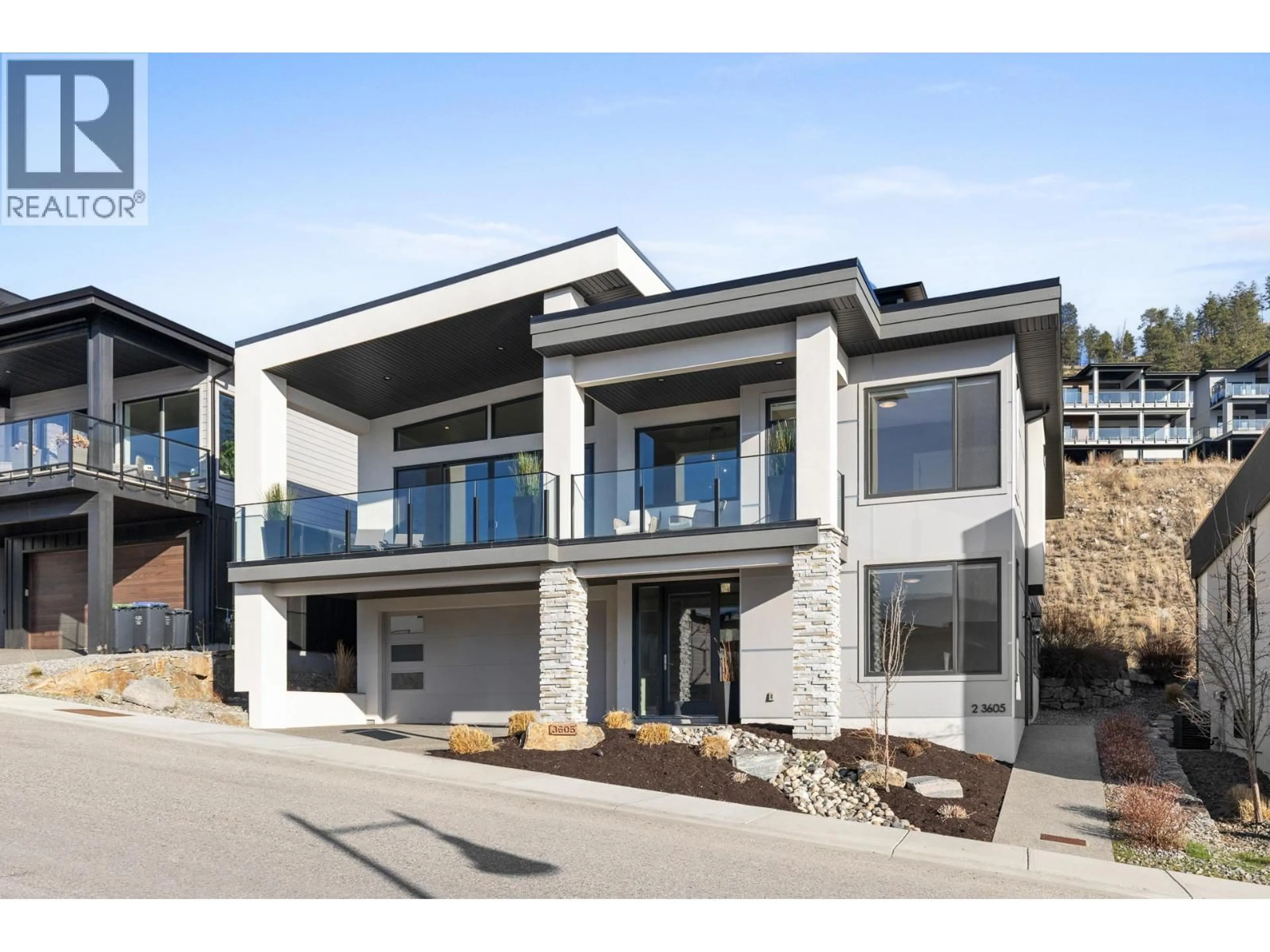 Home with brick exterior material, street for 3605 MCKINLEY BEACH DRIVE, Kelowna British Columbia V1V3G2