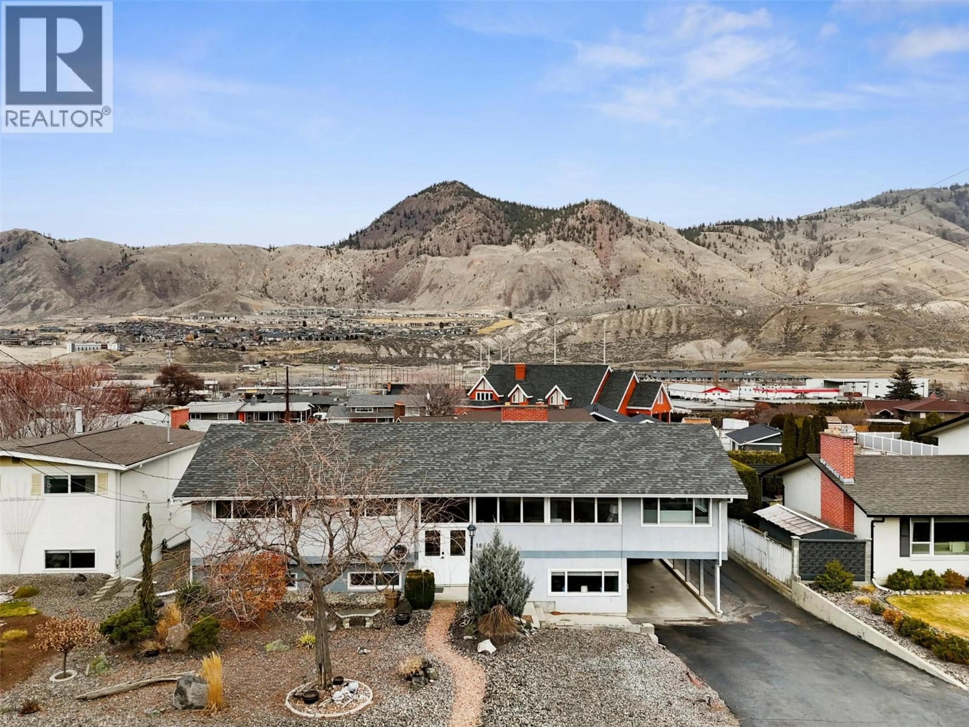 A pic from outside/outdoor area/front of a property/back of a property/a pic from drone, mountain view for 1886 VALLEYVIEW DRIVE, Kamloops British Columbia V2C4B9