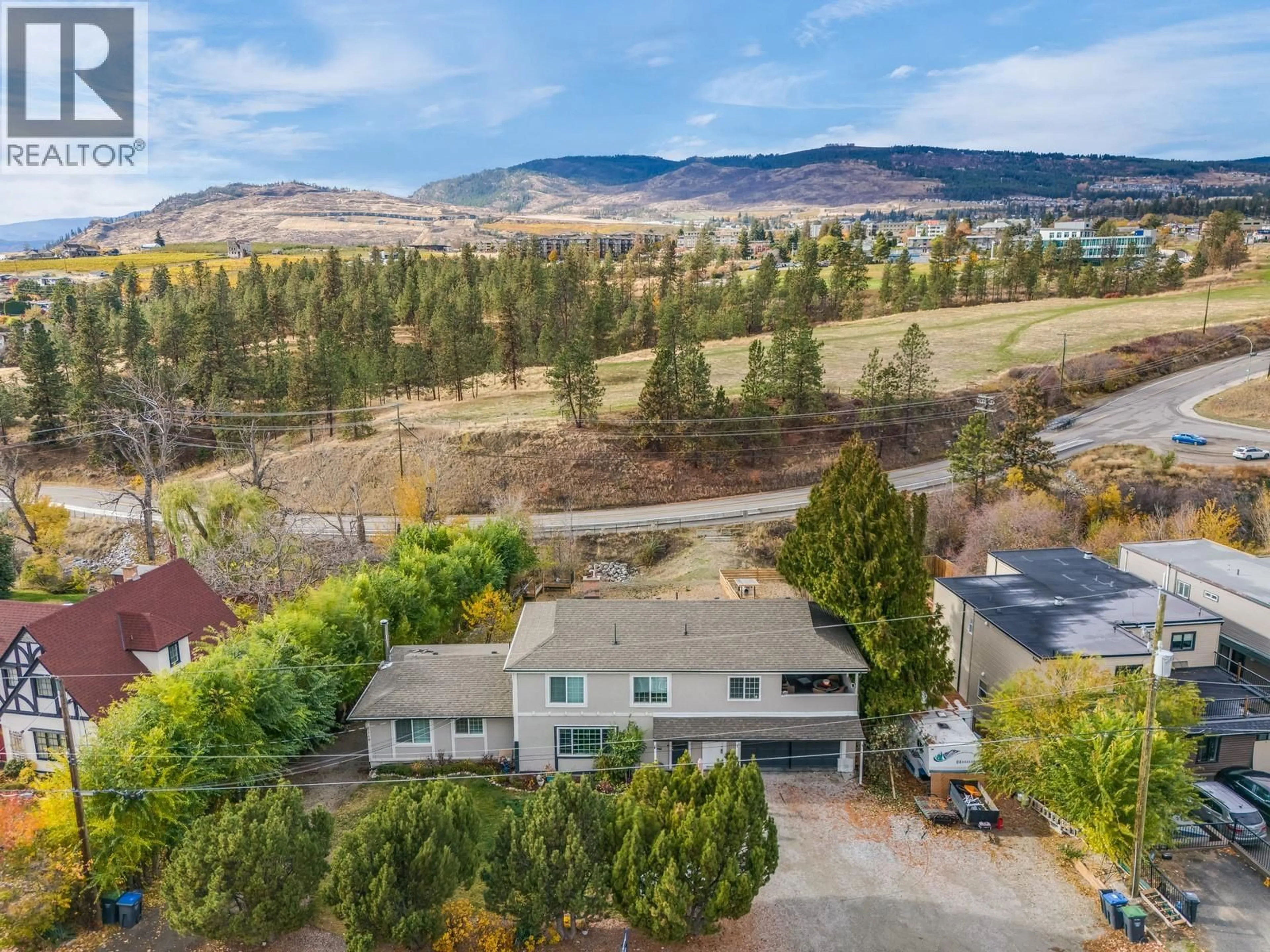 A pic from outside/outdoor area/front of a property/back of a property/a pic from drone, mountain view for 3766 WETTON ROAD, West Kelowna British Columbia V4T2C1