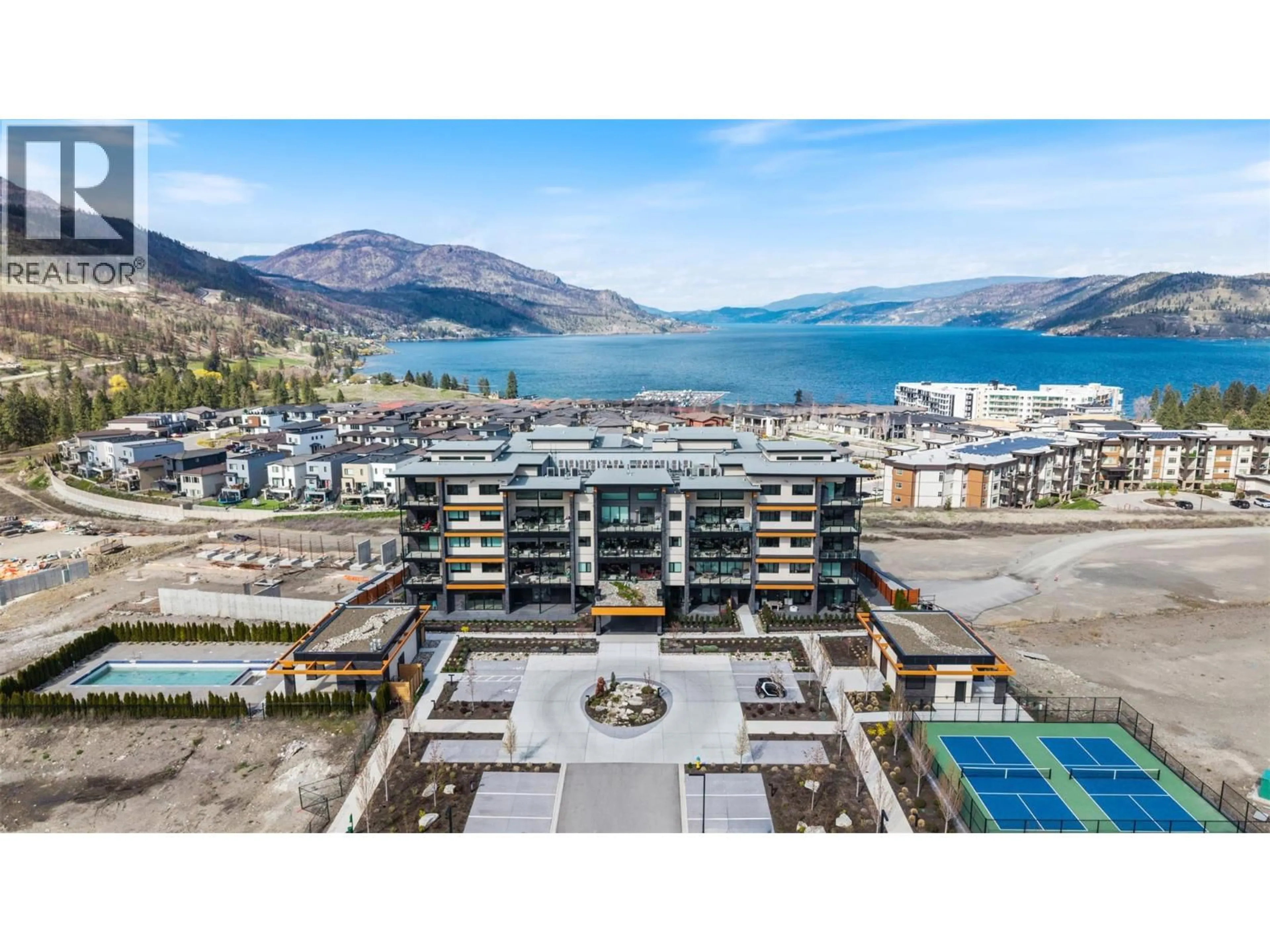 A pic from outside/outdoor area/front of a property/back of a property/a pic from drone, water/lake/river/ocean view for 3308 - 3000 ARIVA DRIVE, Kelowna British Columbia V1Z0B3