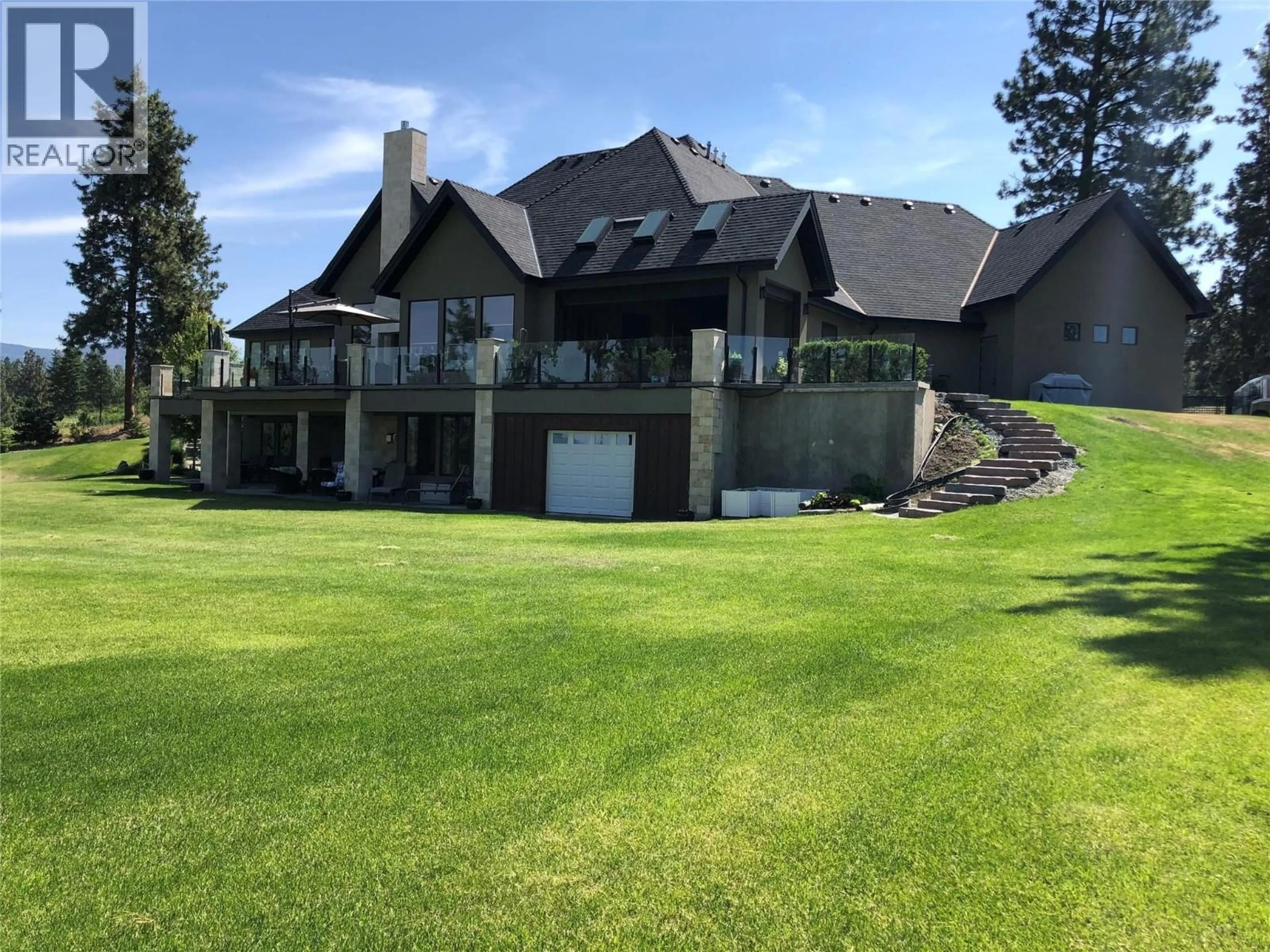 A pic from outside/outdoor area/front of a property/back of a property/a pic from drone, unknown for 3990 FAIRWINDS COURT, Kelowna British Columbia V1W4G1
