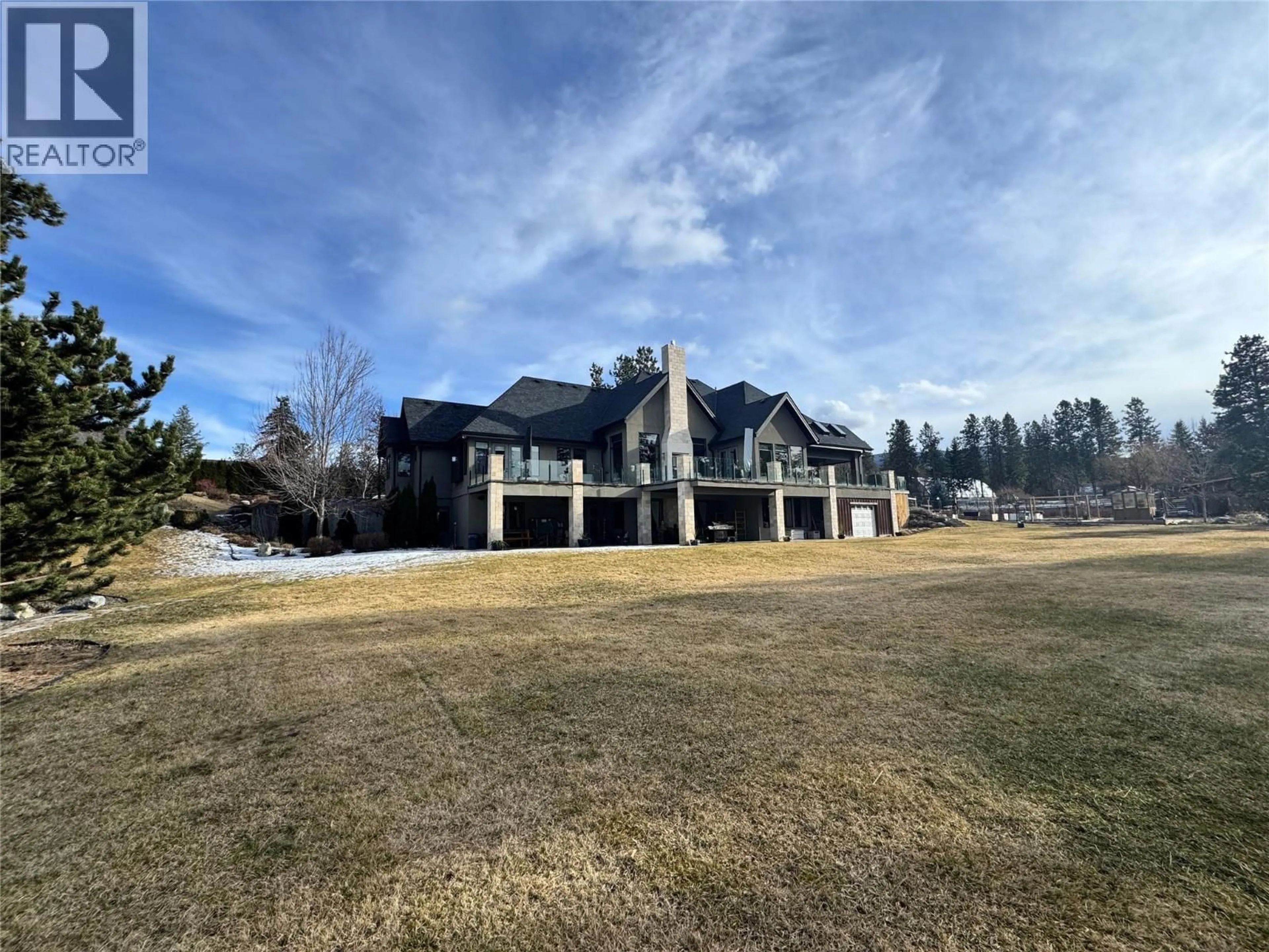 A pic from outside/outdoor area/front of a property/back of a property/a pic from drone, unknown for 3990 FAIRWINDS COURT, Kelowna British Columbia V1W4G1