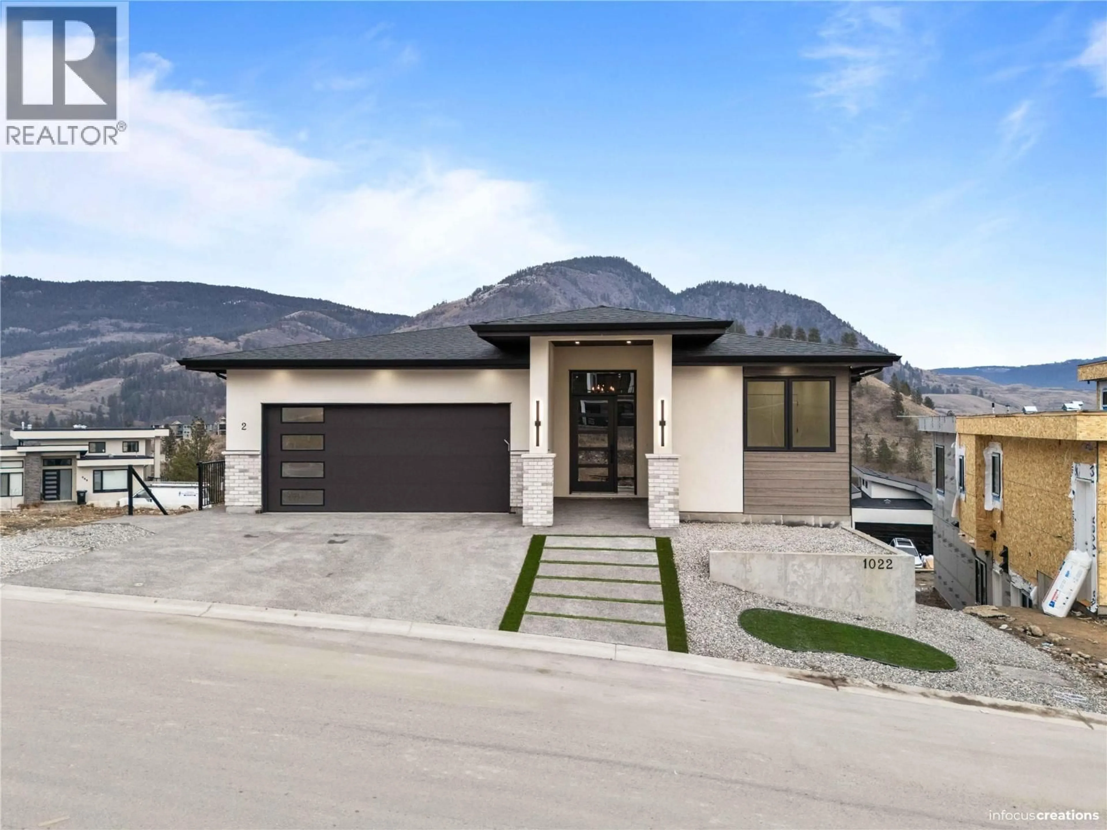 Home with brick exterior material, street for 1022 CARNOUSTIE DRIVE, Kelowna British Columbia V1P0A3