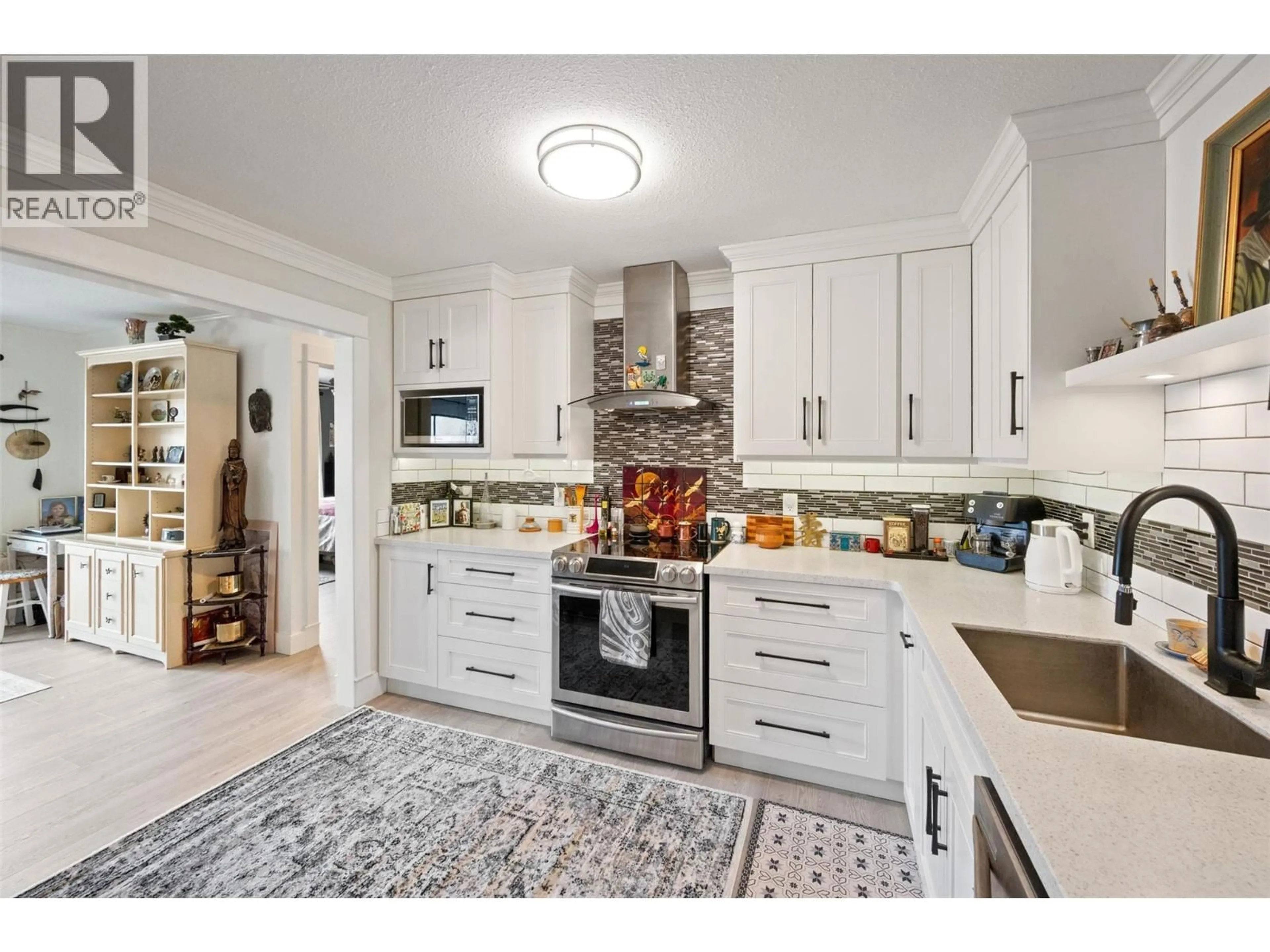 Open concept kitchen, ceramic/tile floor for 304 - 1820 ATKINSON STREET, Penticton British Columbia V2A7M6