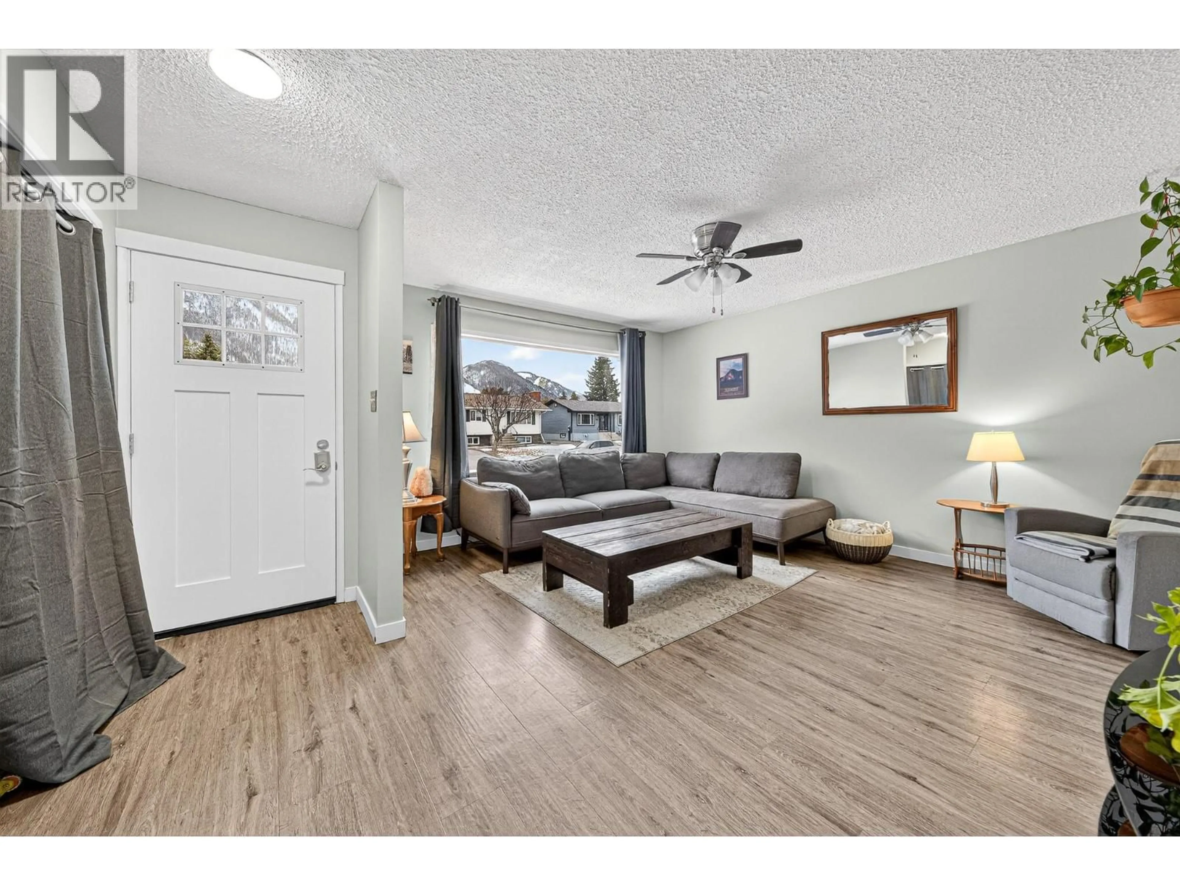 Living room with furniture, wood/laminate floor for 482 ENGELMANN SPRUCE DRIVE, Sparwood British Columbia V0B2G0