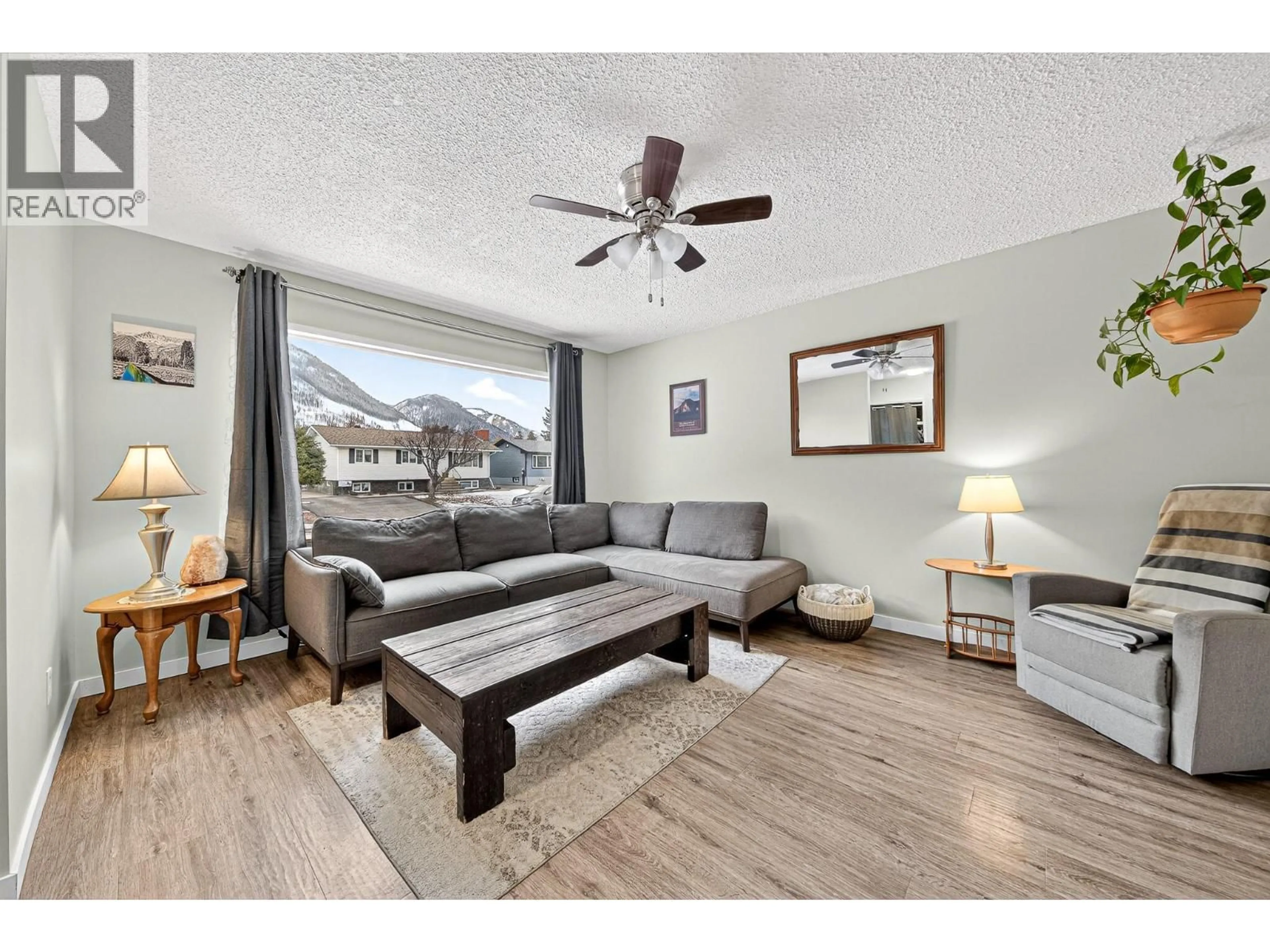Living room with furniture, wood/laminate floor for 482 ENGELMANN SPRUCE DRIVE, Sparwood British Columbia V0B2G0