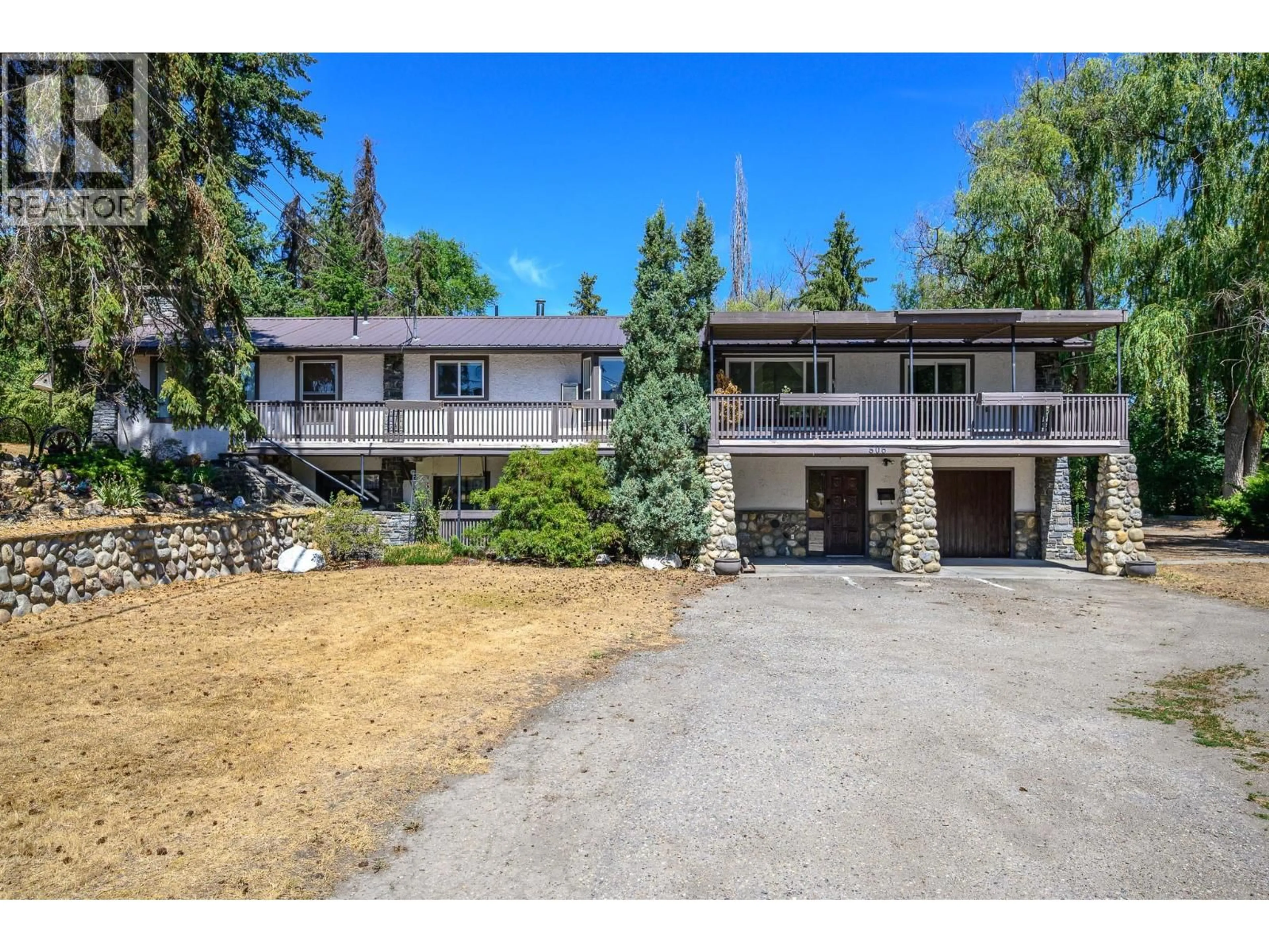 A pic from outside/outdoor area/front of a property/back of a property/a pic from drone, unknown for 506 BROWNE ROAD, Vernon British Columbia V1T7M1
