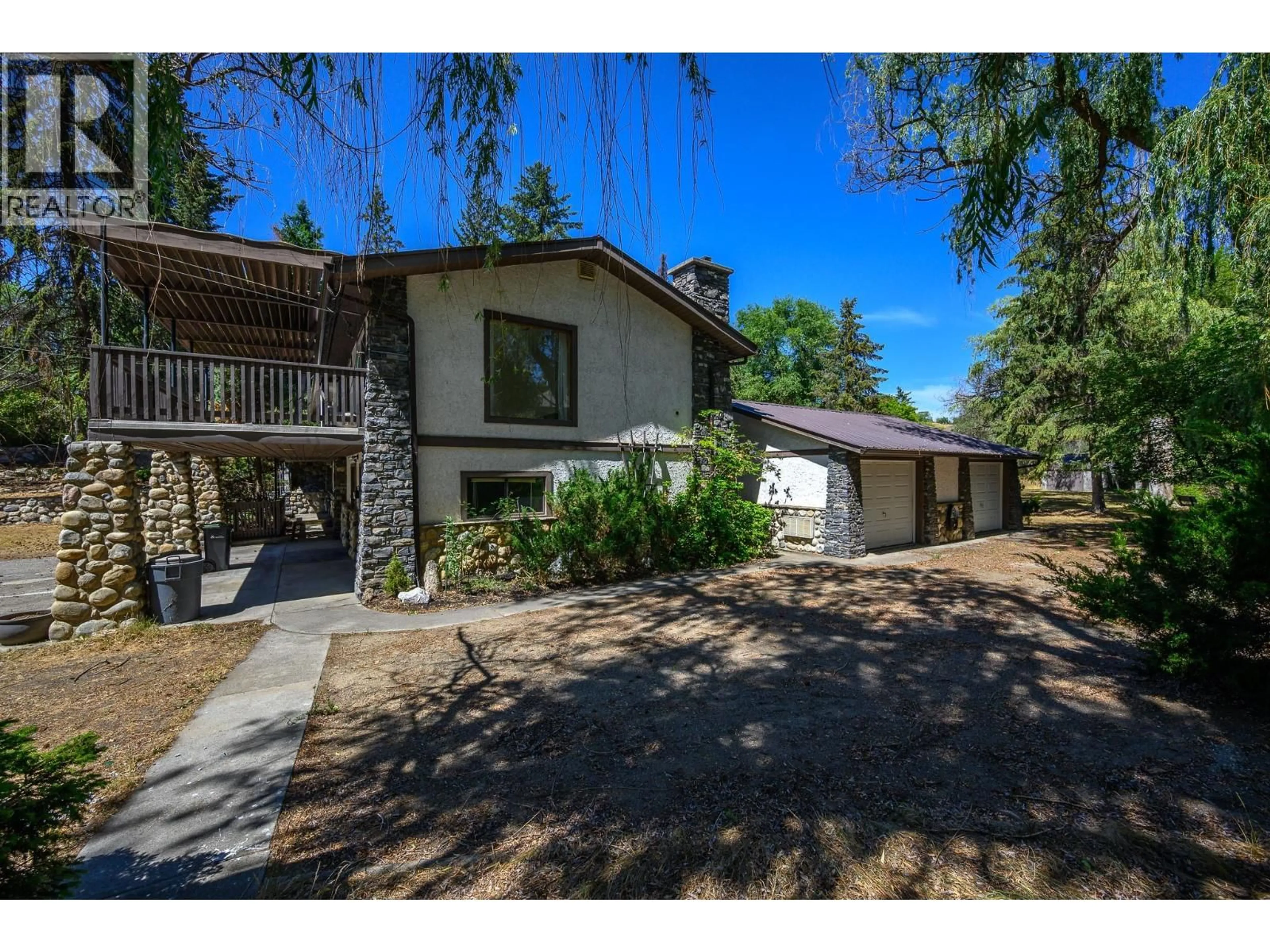 A pic from outside/outdoor area/front of a property/back of a property/a pic from drone, street for 506 BROWNE ROAD, Vernon British Columbia V1T7M1