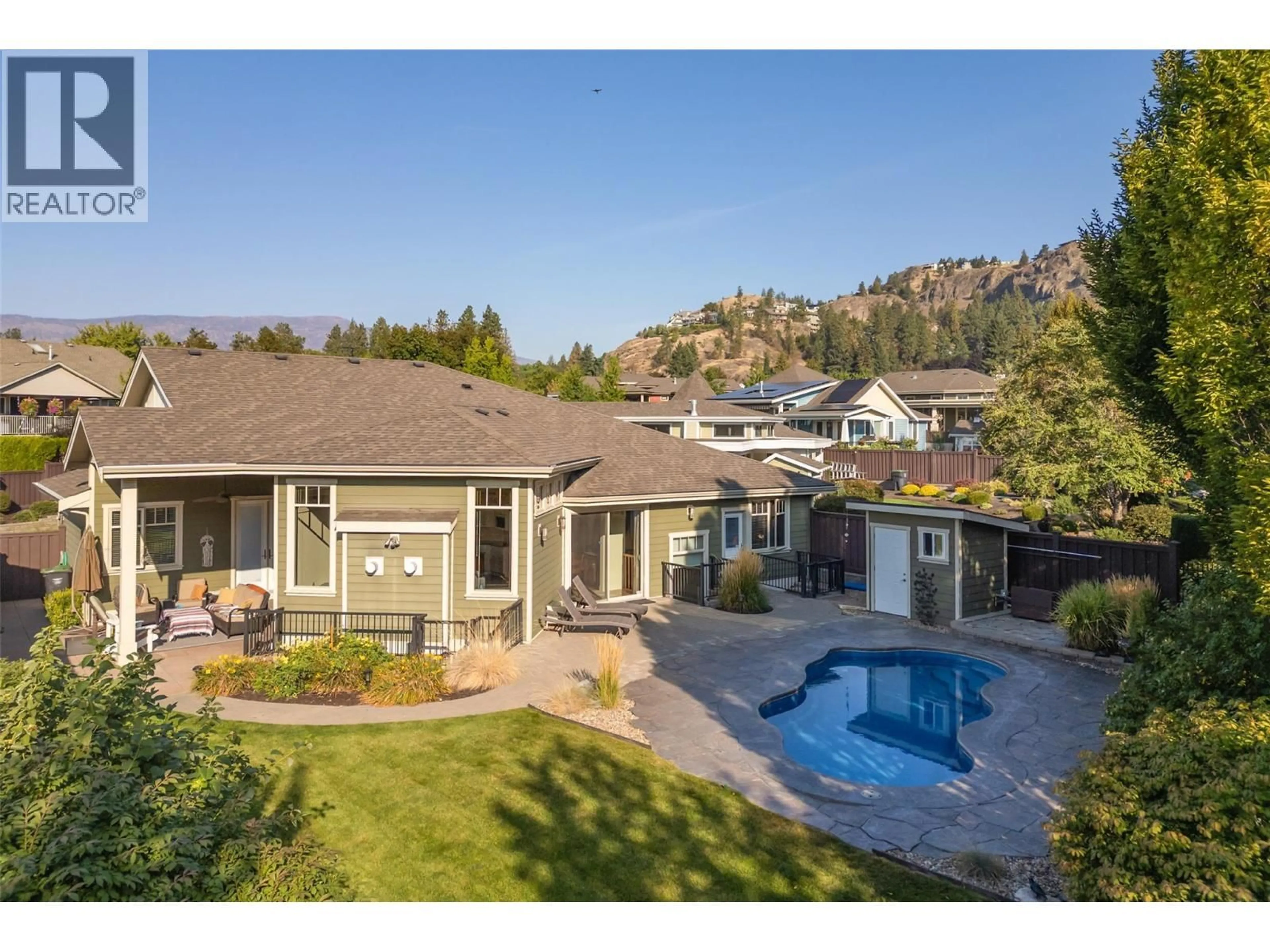 A pic from outside/outdoor area/front of a property/back of a property/a pic from drone, mountain view for 1147 GLENVIEW COURT, Kelowna British Columbia V1Y0A7
