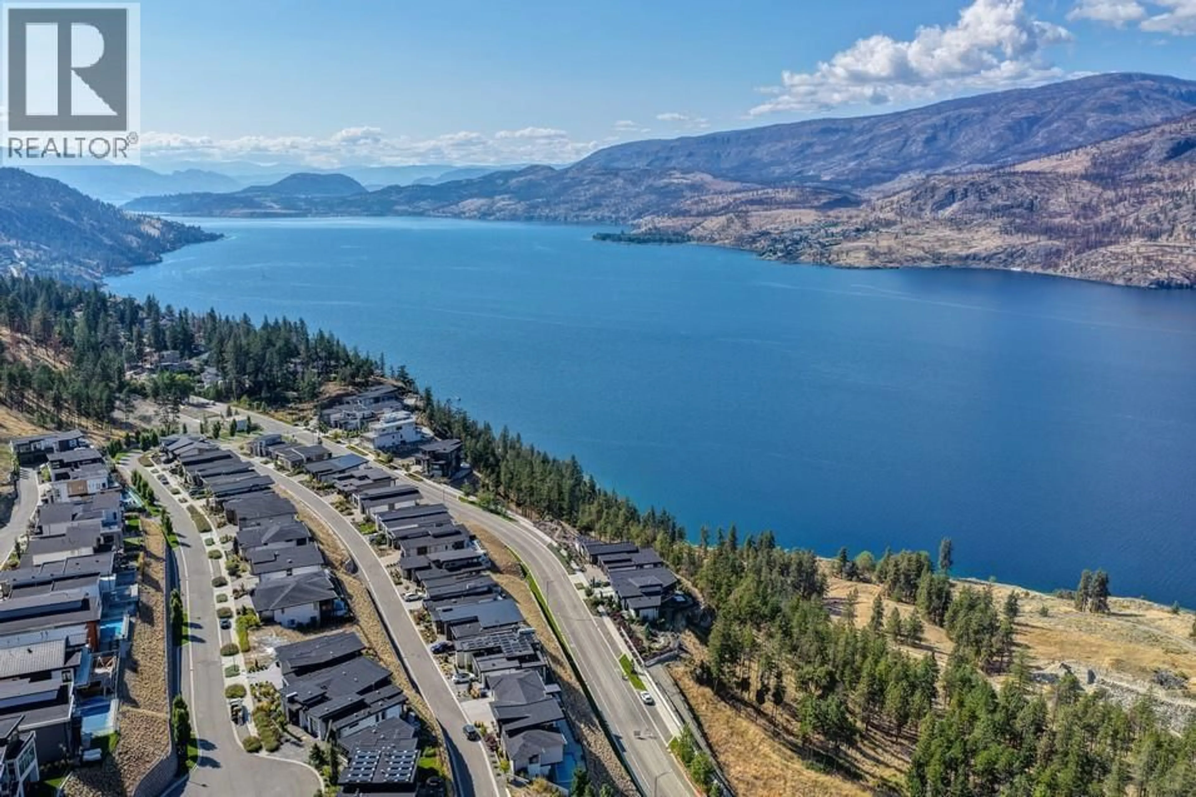 A pic from outside/outdoor area/front of a property/back of a property/a pic from drone, water/lake/river/ocean view for 604 CLIFTON ROAD NORTH, Kelowna British Columbia V1V0B7