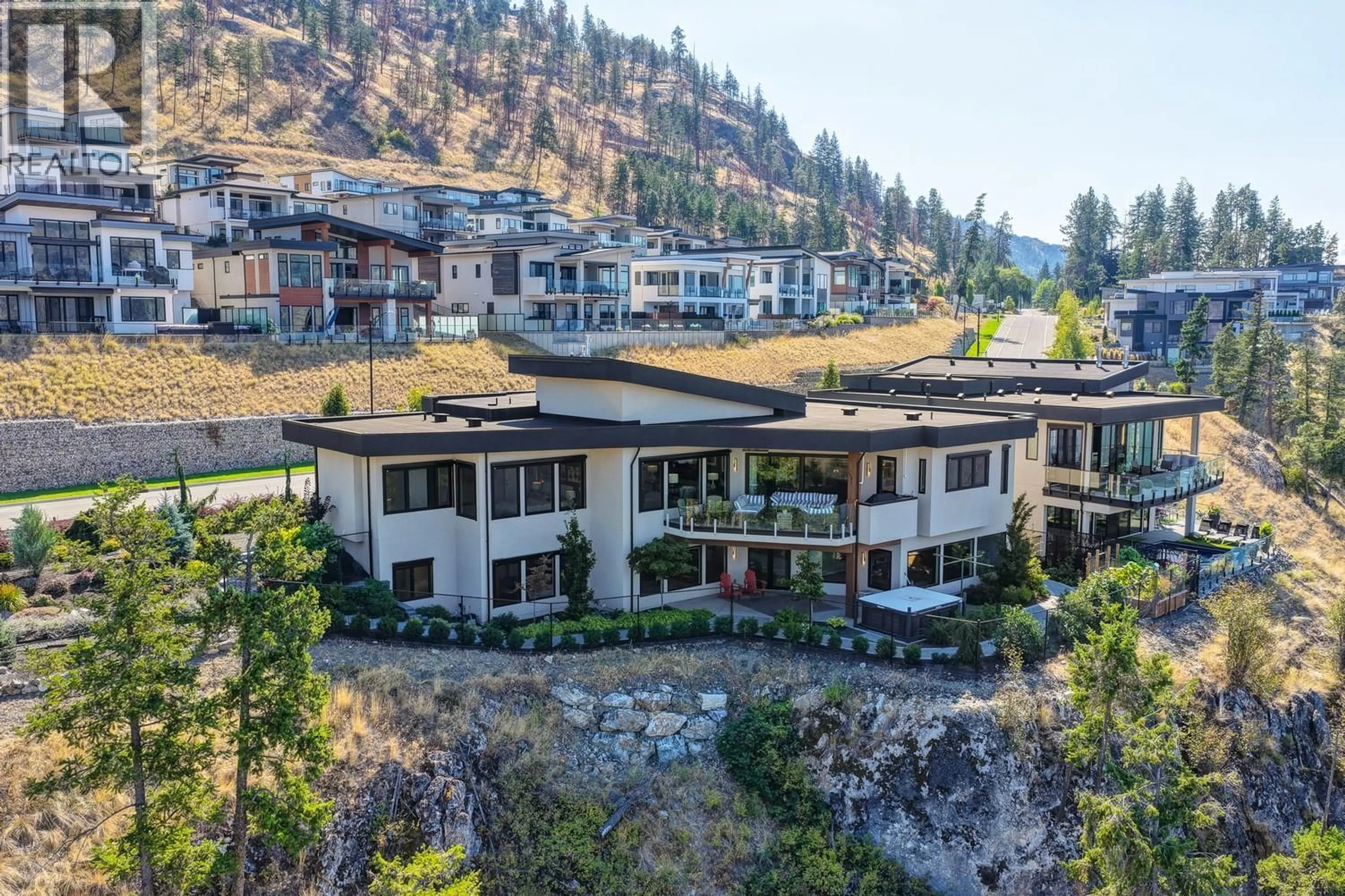 A pic from outside/outdoor area/front of a property/back of a property/a pic from drone, mountain view for 604 CLIFTON ROAD NORTH, Kelowna British Columbia V1V0B7