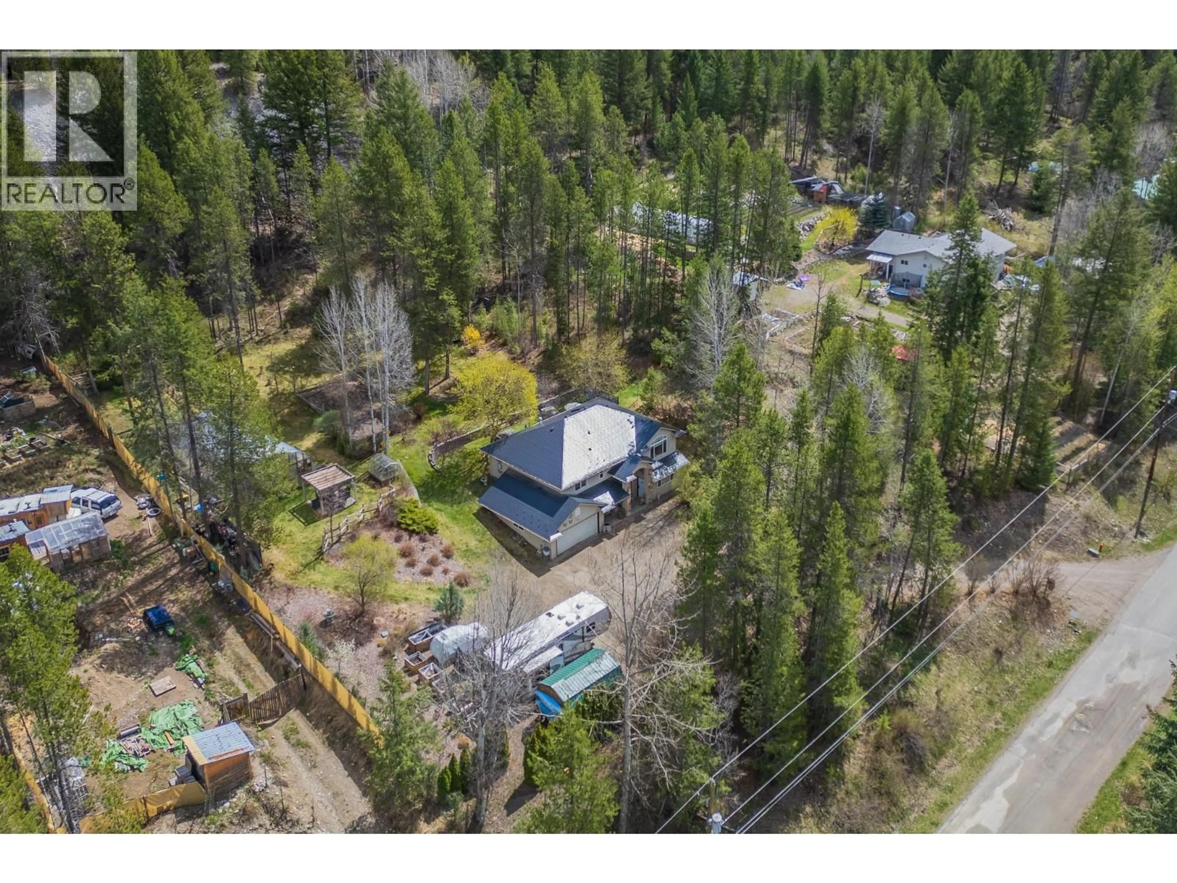 A pic from outside/outdoor area/front of a property/back of a property/a pic from drone, forest/trees view for 610 STRATHMORE AVENUE, Greenwood British Columbia V0H1J0