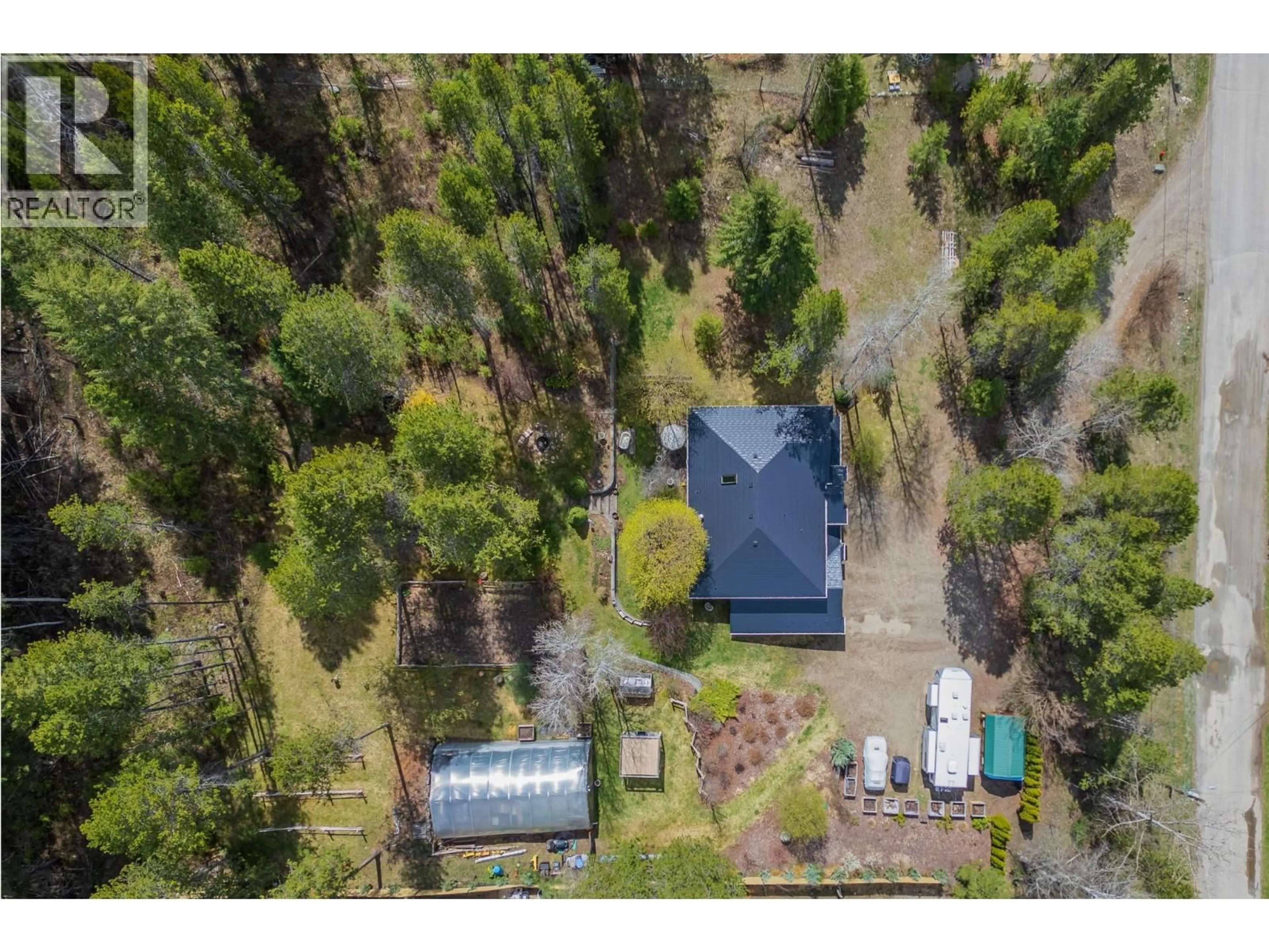 A pic from outside/outdoor area/front of a property/back of a property/a pic from drone, forest/trees view for 610 STRATHMORE AVENUE, Greenwood British Columbia V0H1J0