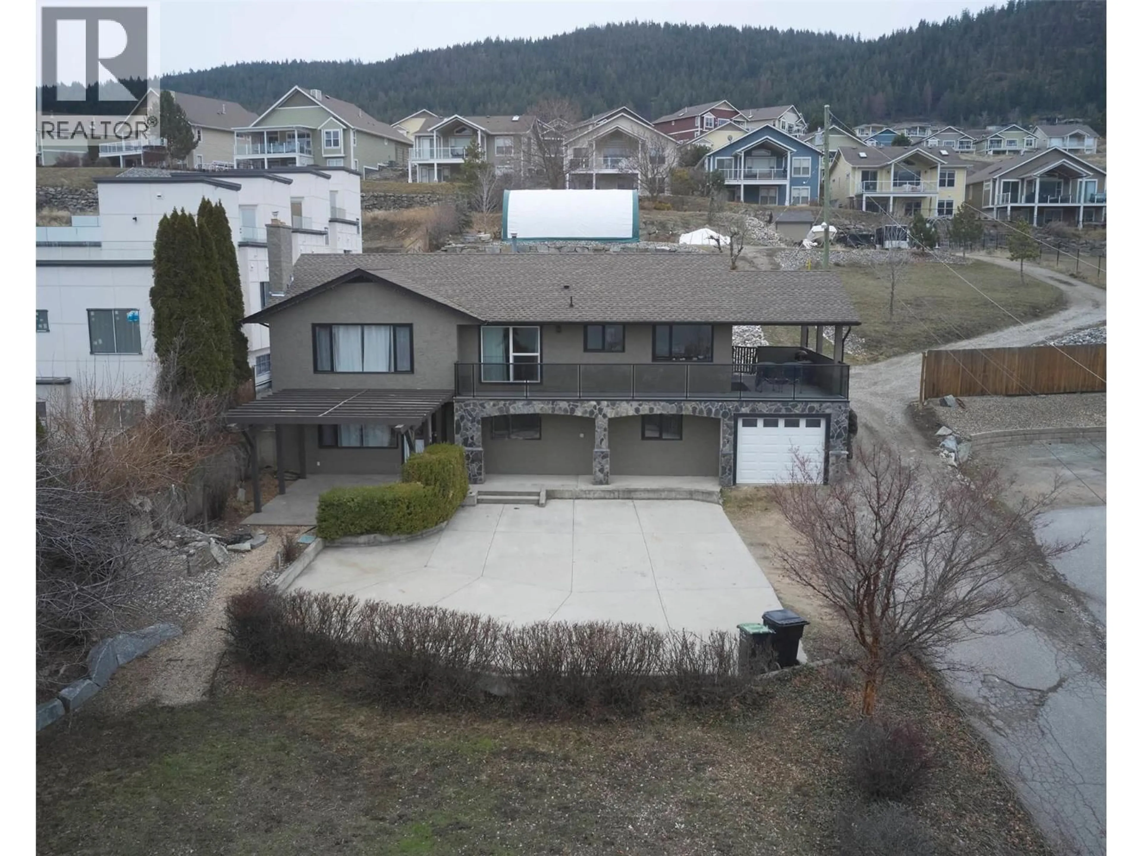 A pic from outside/outdoor area/front of a property/back of a property/a pic from drone, mountain view for 7676 OKANAGAN LANDING ROAD, Vernon British Columbia V1H1G9