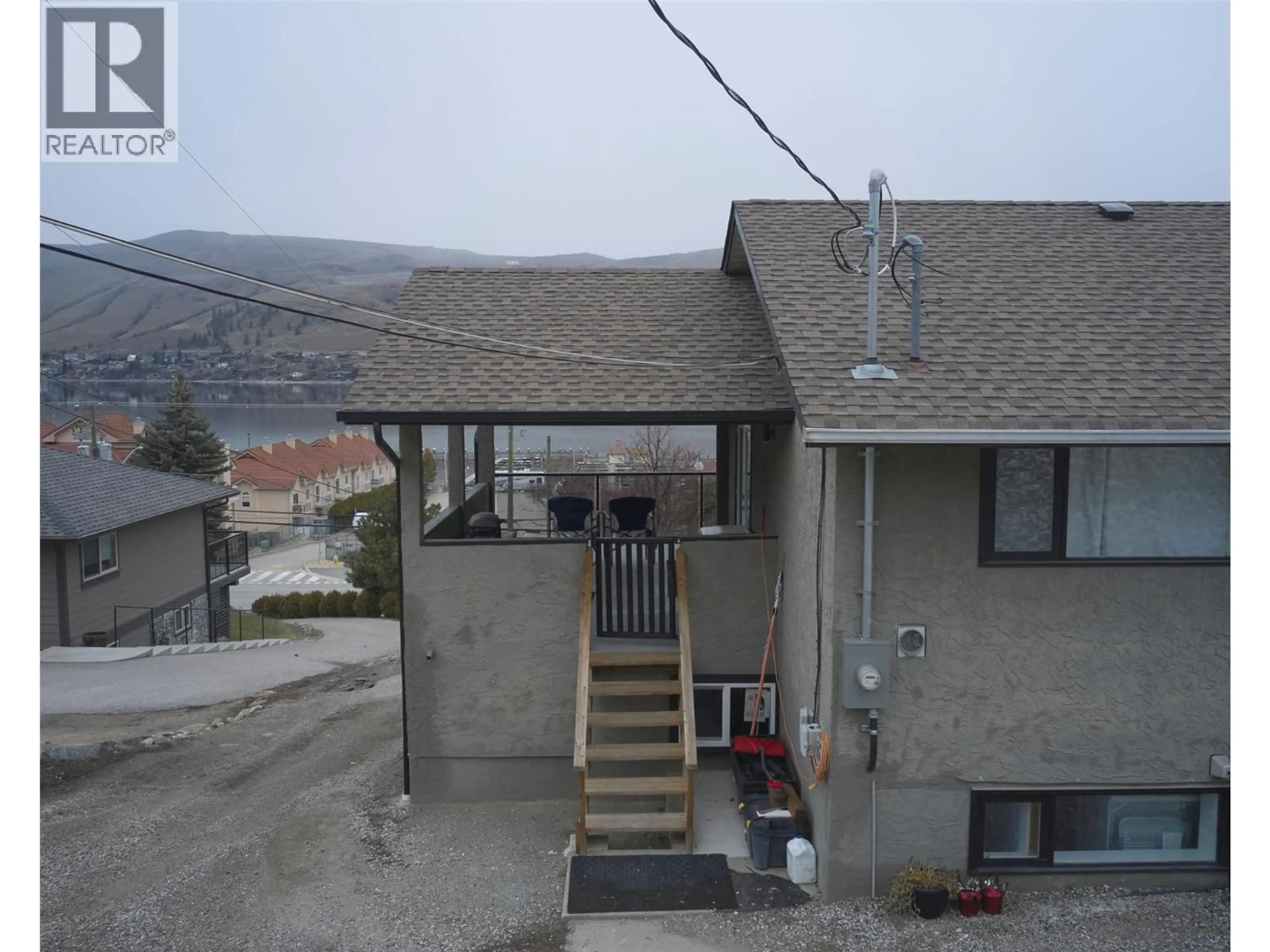A pic from outside/outdoor area/front of a property/back of a property/a pic from drone, unknown for 7676 OKANAGAN LANDING ROAD, Vernon British Columbia V1H1G9