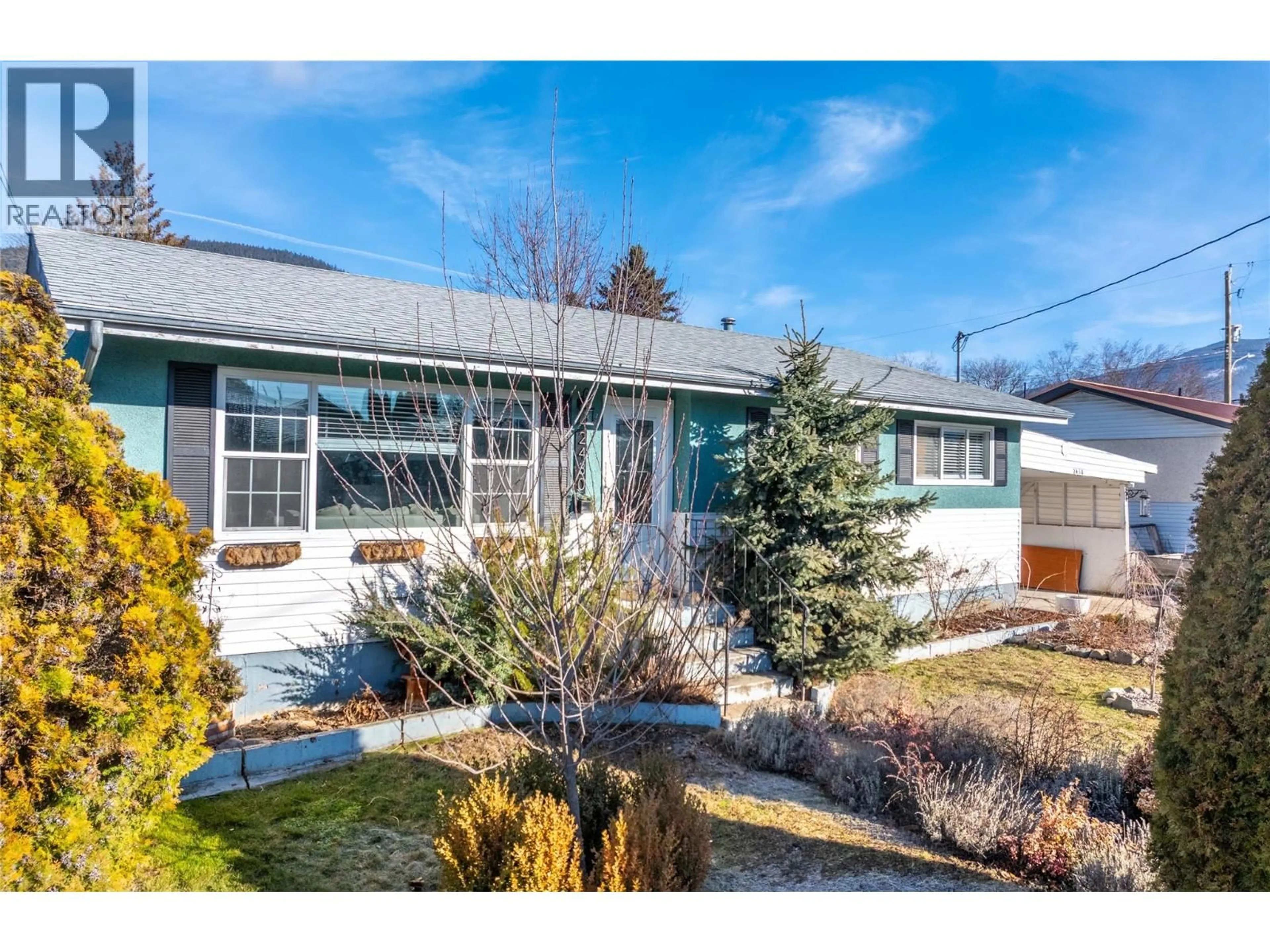 Home with vinyl exterior material, street for 2430 BIRCH STREET, Creston British Columbia V0B1G5