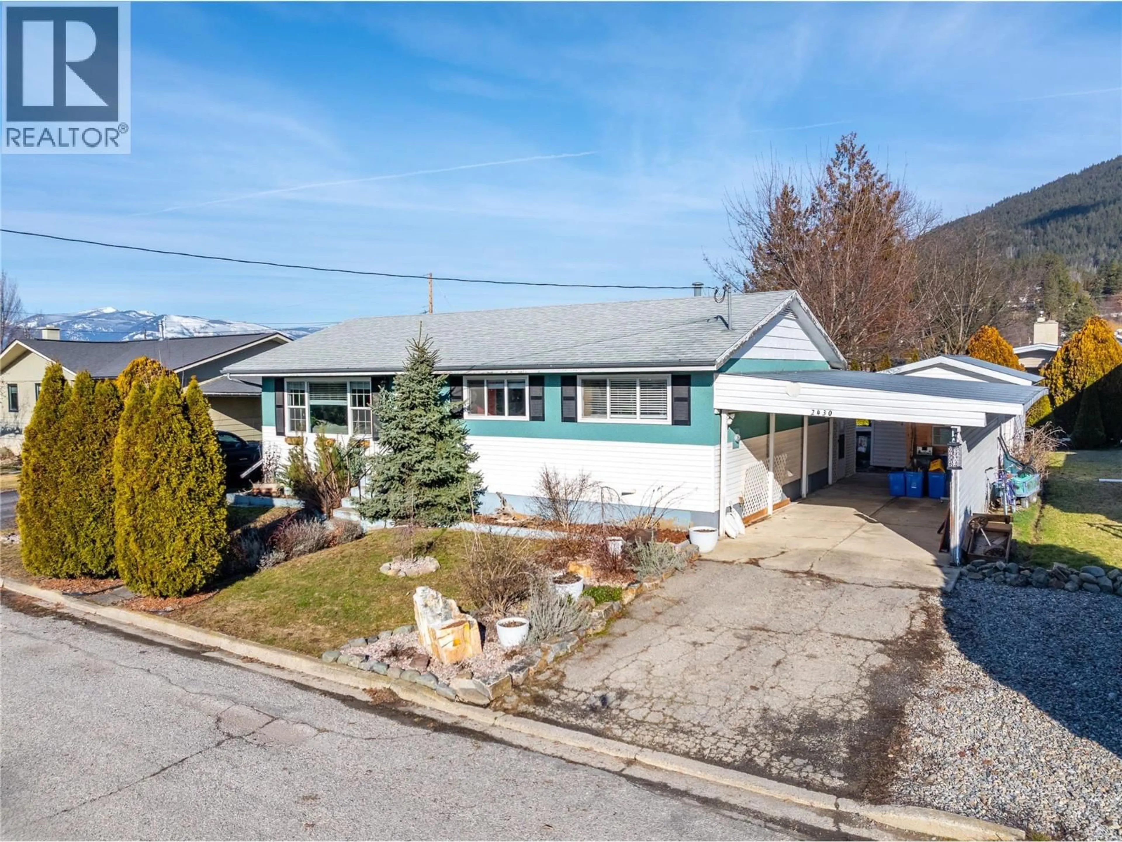 A pic from outside/outdoor area/front of a property/back of a property/a pic from drone, street for 2430 BIRCH STREET, Creston British Columbia V0B1G5