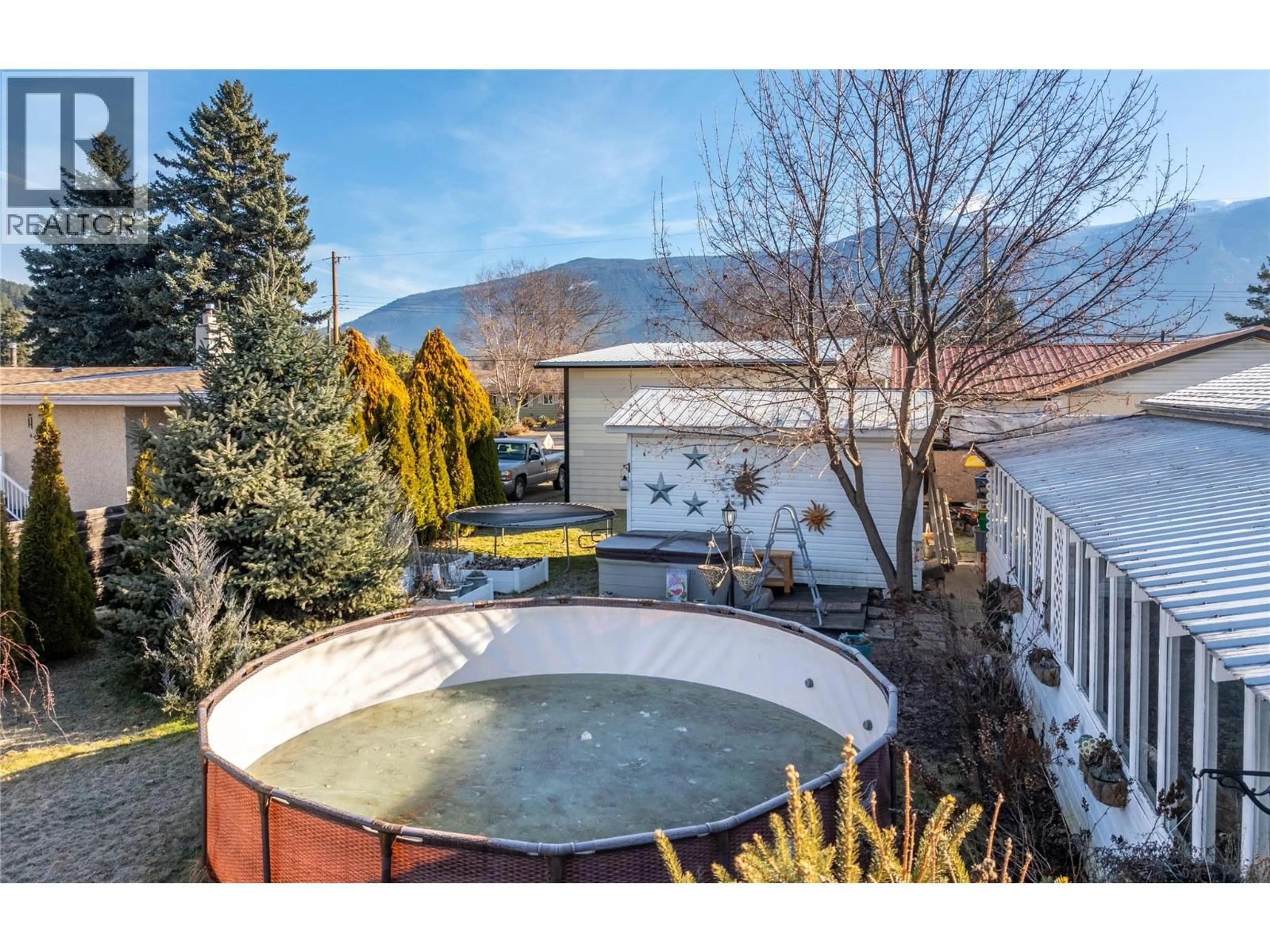 A pic from outside/outdoor area/front of a property/back of a property/a pic from drone, mountain view for 2430 BIRCH STREET, Creston British Columbia V0B1G5