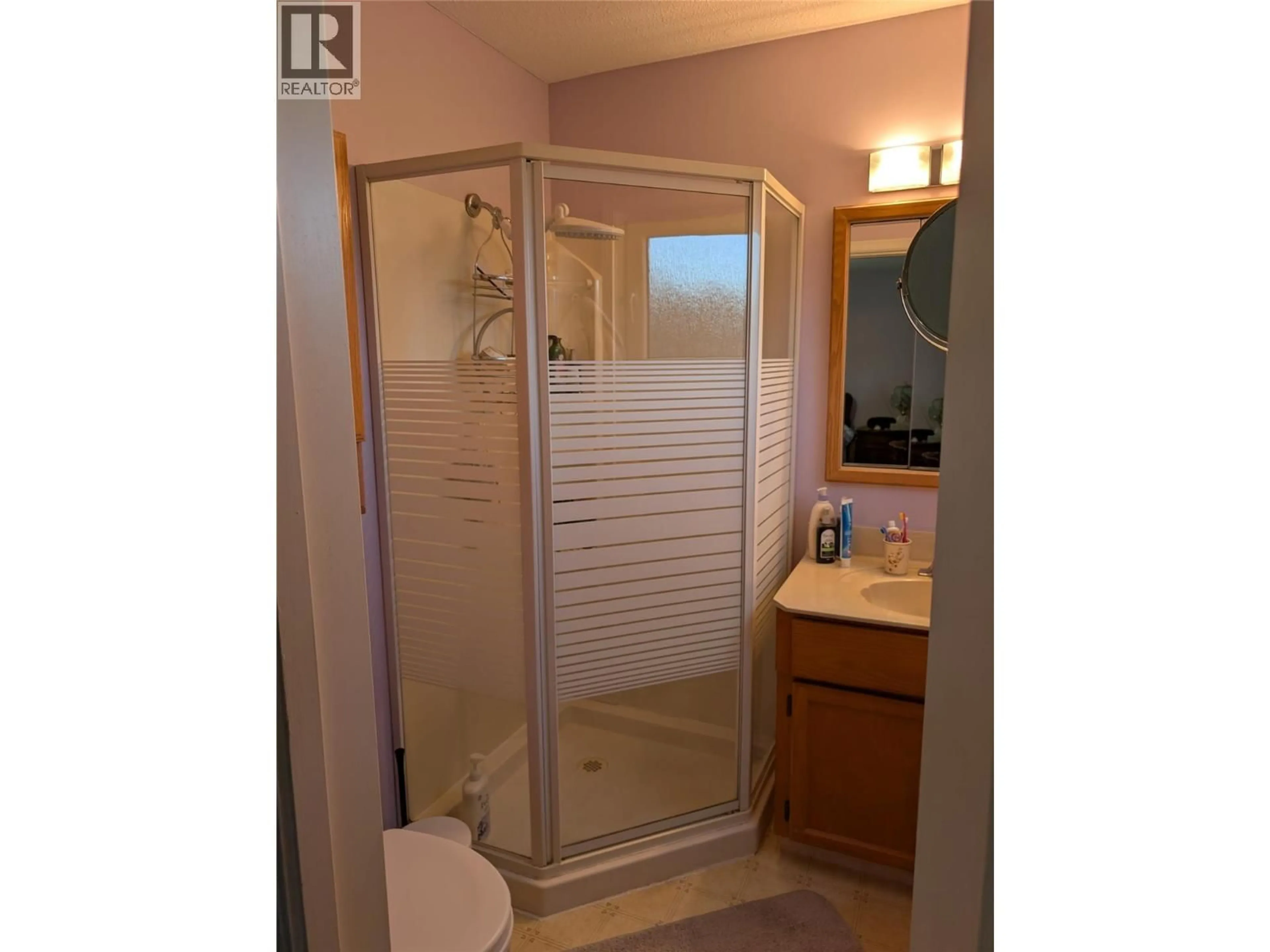 Standard bathroom, ceramic/tile floor for 215 GREENWOOD DRIVE, Penticton British Columbia V2A7P9