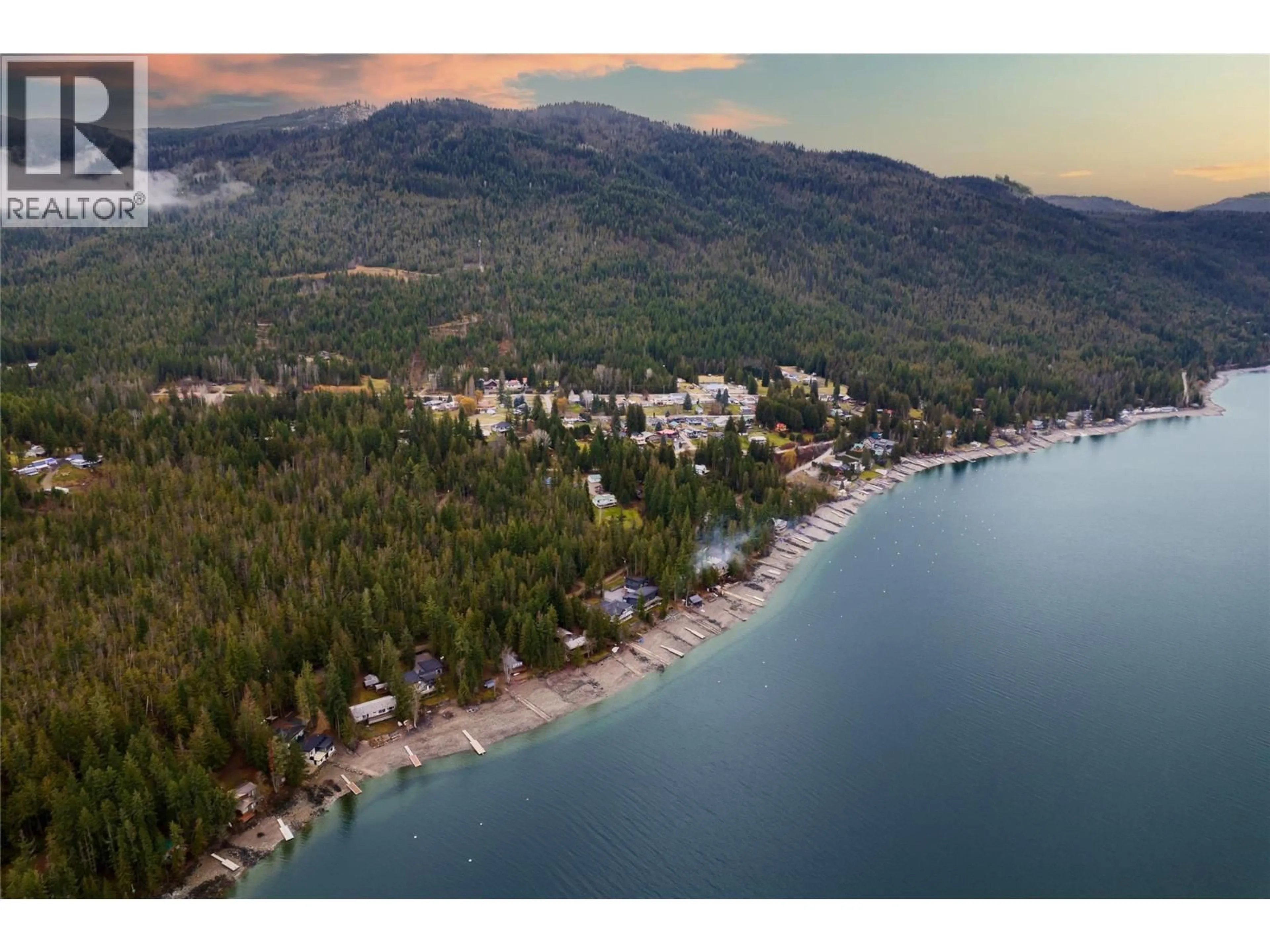 A pic from outside/outdoor area/front of a property/back of a property/a pic from drone, water/lake/river/ocean view for 4119 REID ROAD, Eagle Bay British Columbia V0E1T0