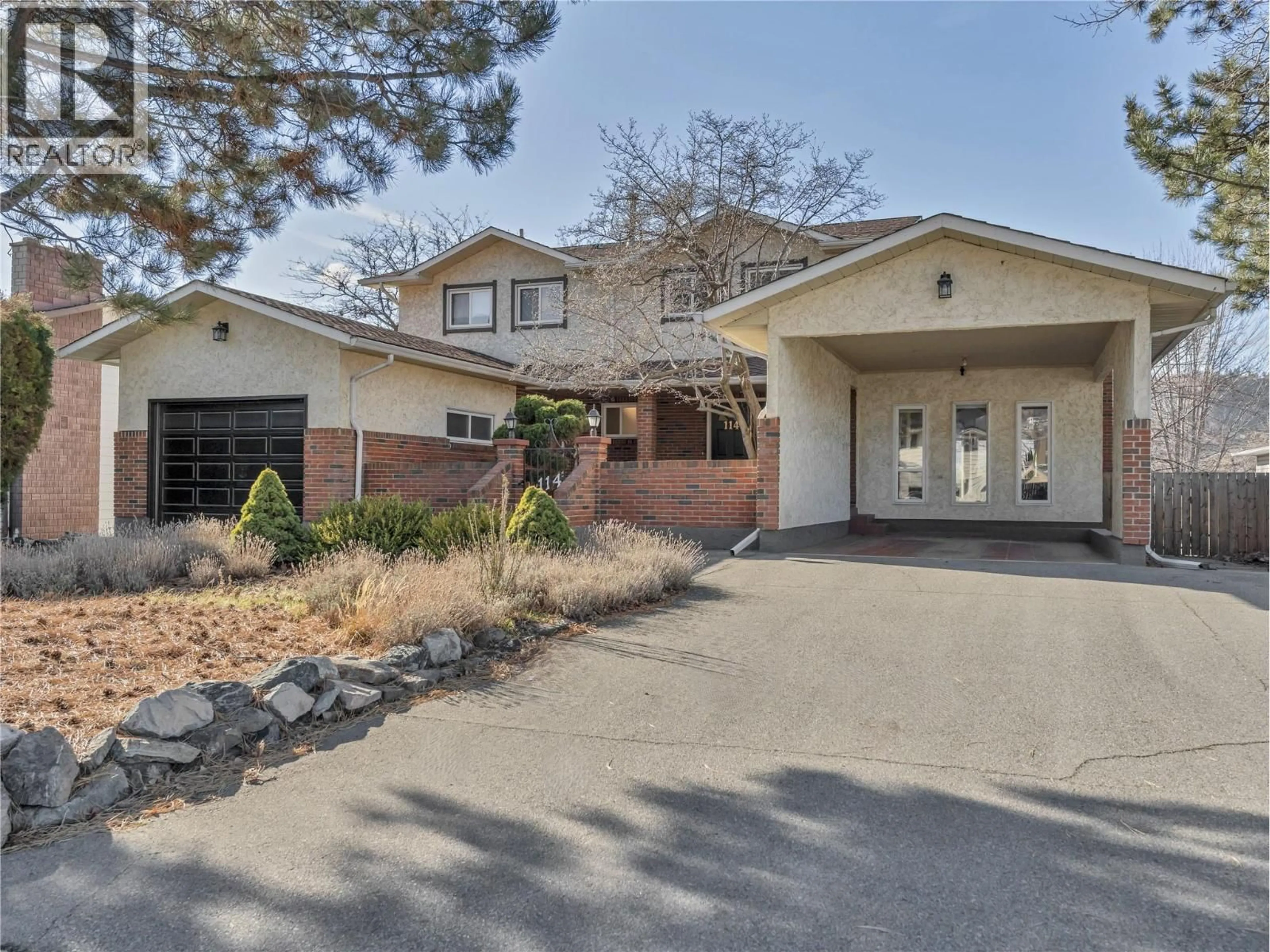 Home with brick exterior material, street for 114 MURRAY DRIVE, Penticton British Columbia V2A7E4