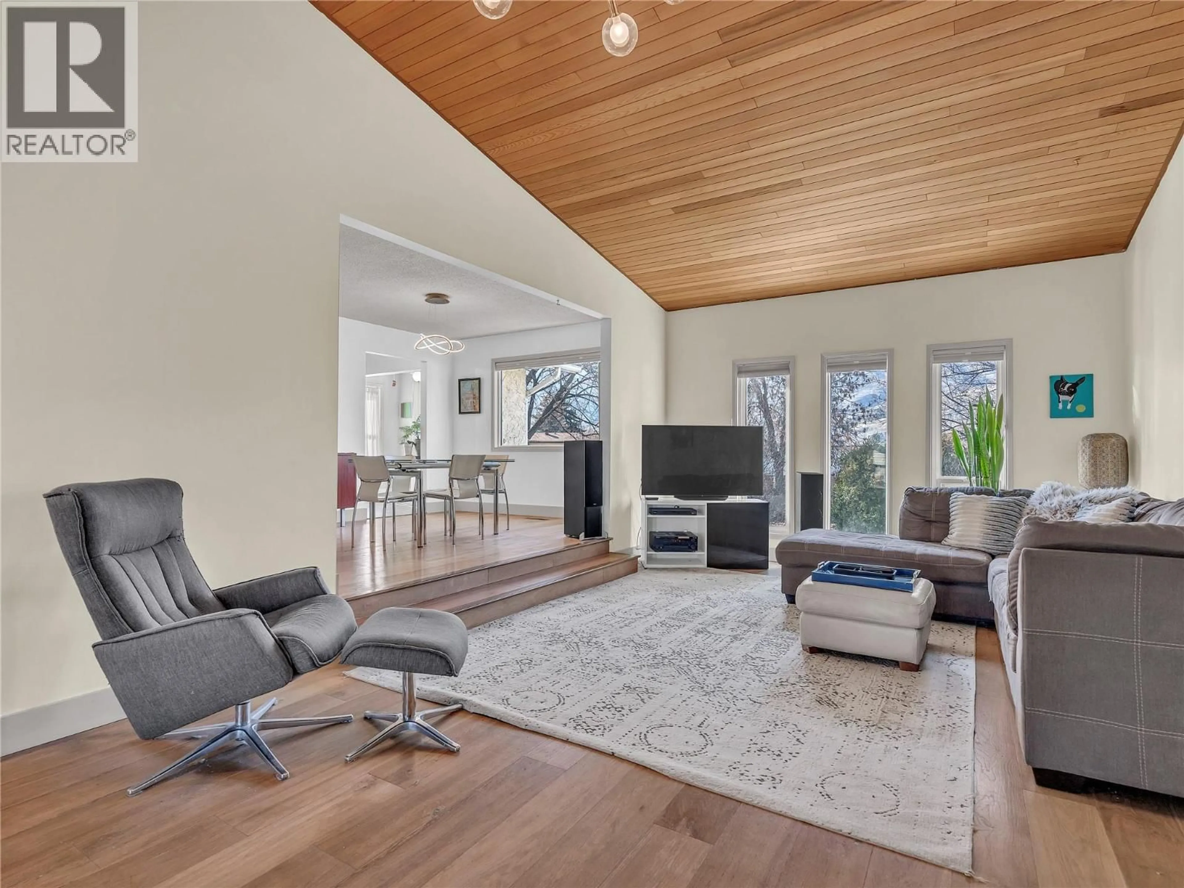 Living room with furniture, wood/laminate floor for 114 MURRAY DRIVE, Penticton British Columbia V2A7E4