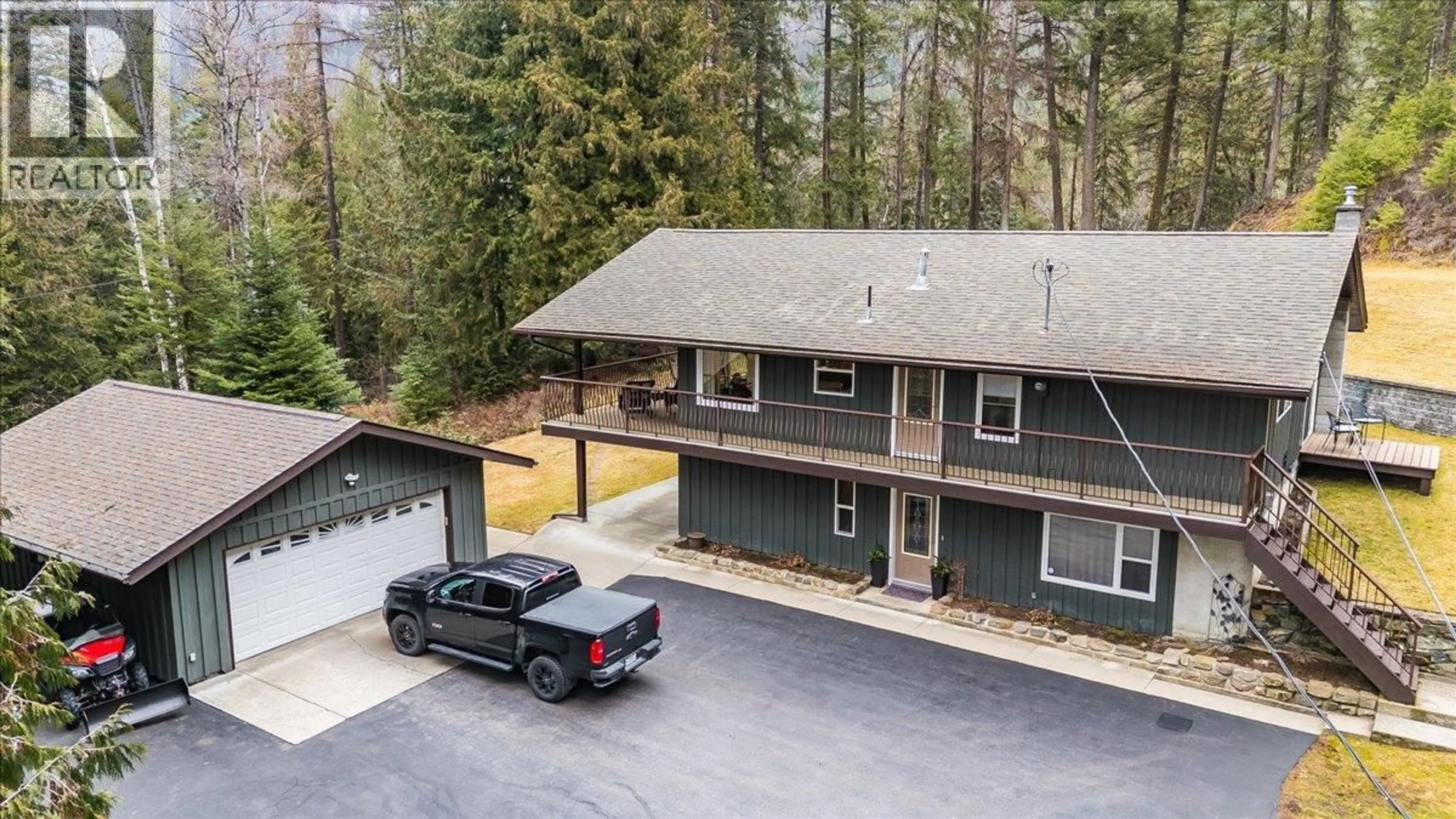 A pic from outside/outdoor area/front of a property/back of a property/a pic from drone, unknown for 2162 OLD SALMO ROAD, Fruitvale British Columbia V0G1L1