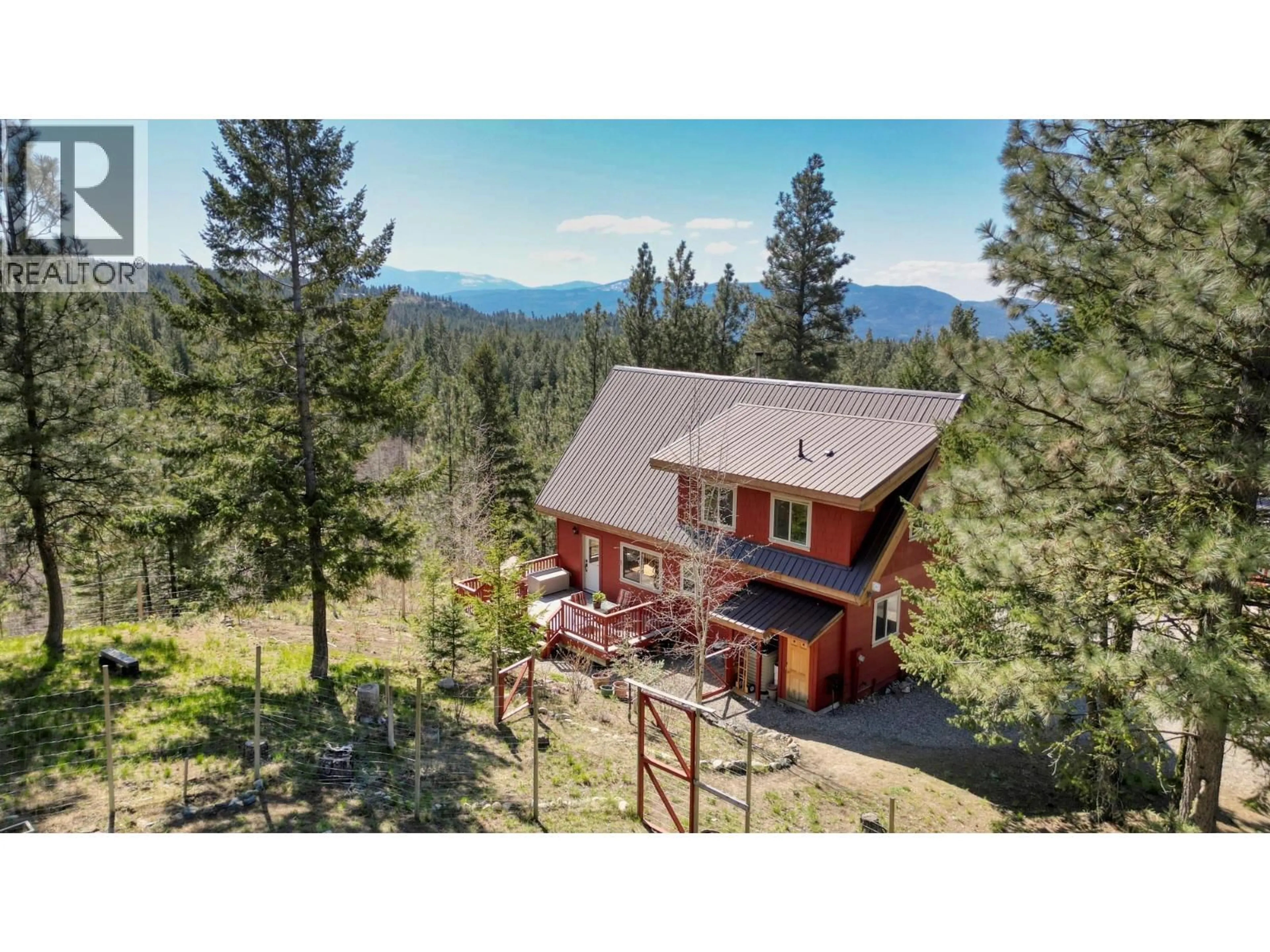 A pic from outside/outdoor area/front of a property/back of a property/a pic from drone, mountain view for 155 COUGAR COURT, Osoyoos British Columbia V0H1V6