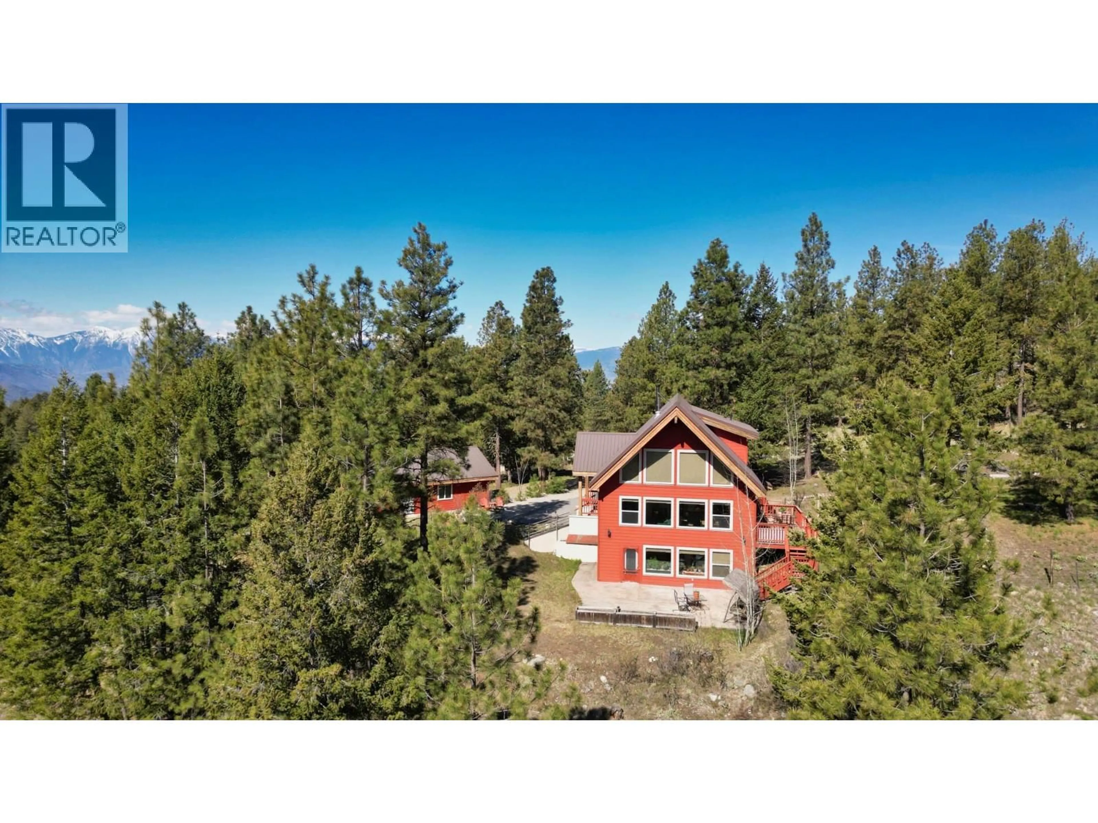 A pic from outside/outdoor area/front of a property/back of a property/a pic from drone, forest/trees view for 155 COUGAR COURT, Osoyoos British Columbia V0H1V6