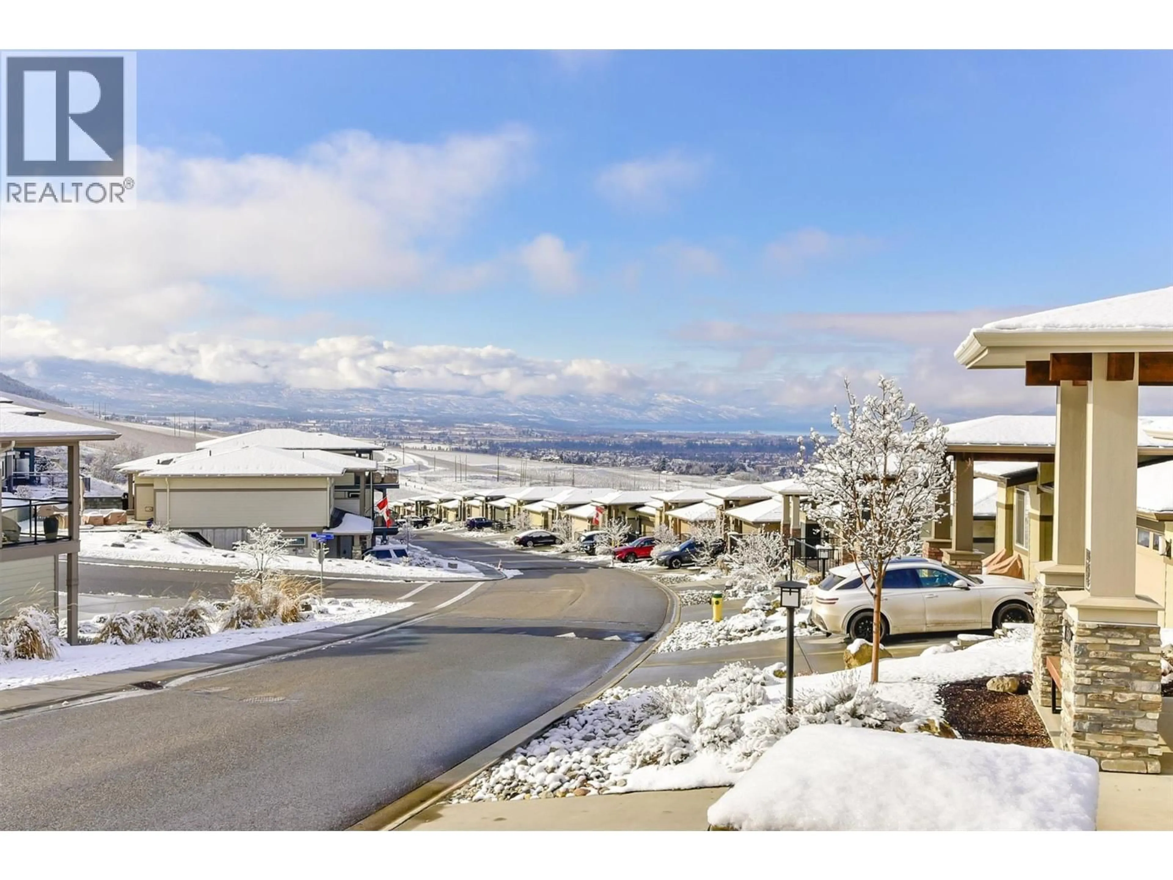 A pic from outside/outdoor area/front of a property/back of a property/a pic from drone, mountain view for 1508 TOWER RANCH DRIVE, Kelowna British Columbia V1P1T8