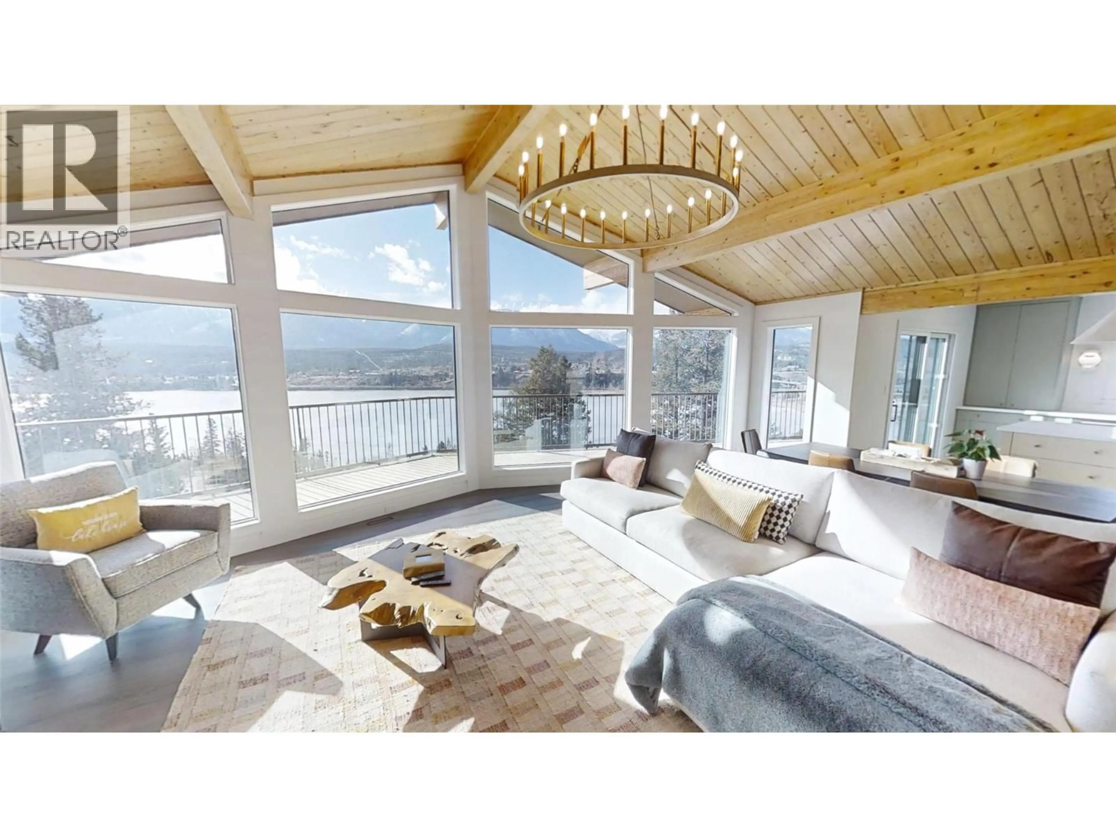 Living room with furniture, wood/laminate floor for 521 UPPER LAKEVIEW ROAD, Invermere British Columbia V0A1K3
