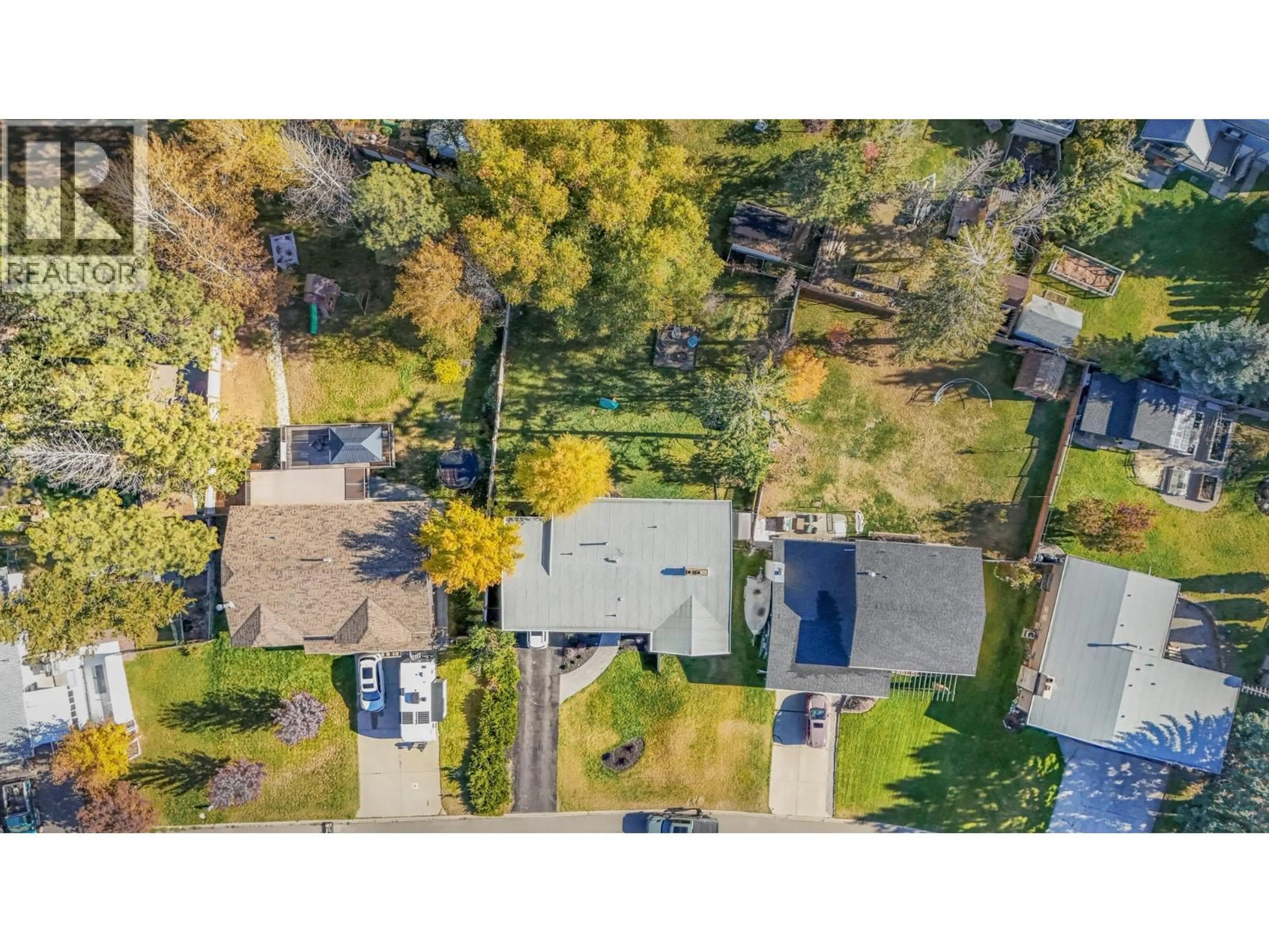 A pic from outside/outdoor area/front of a property/back of a property/a pic from drone, street for 1816 MT CONNELL CRESCENT, Cranbrook British Columbia V1C5V7