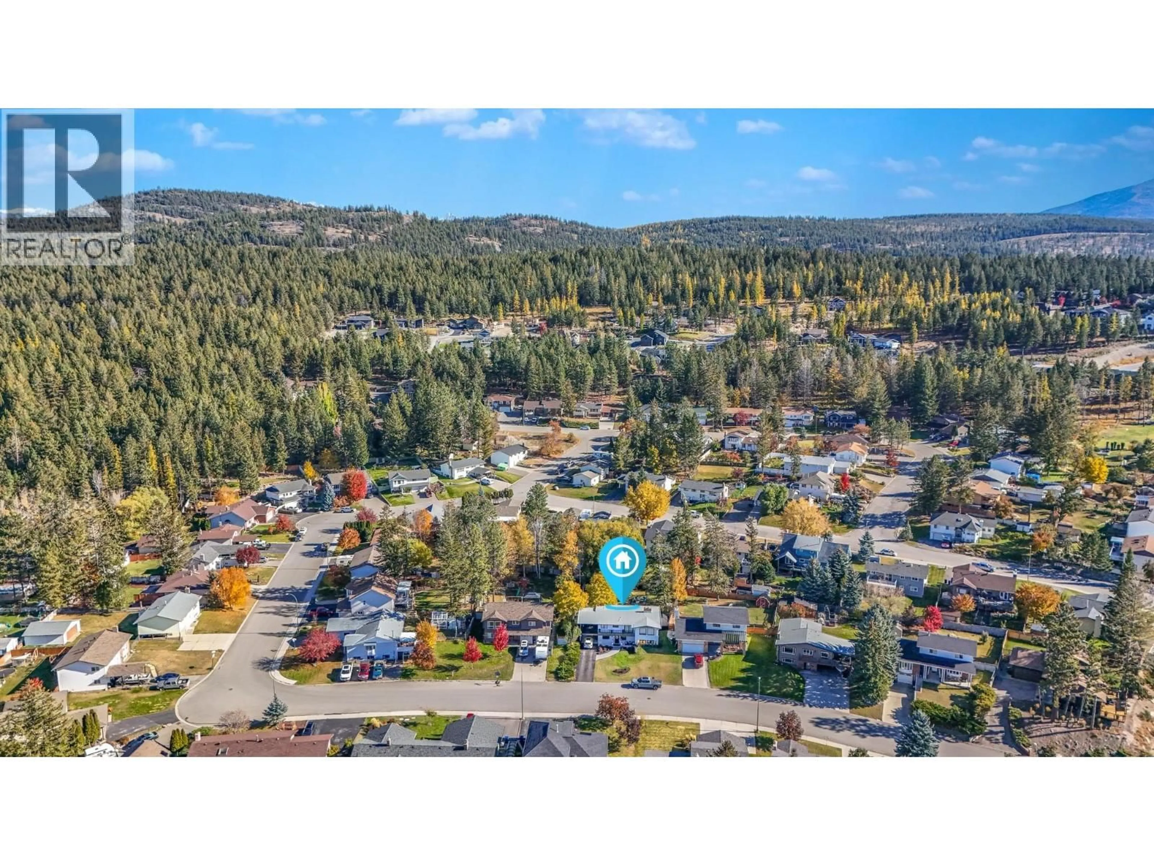 A pic from outside/outdoor area/front of a property/back of a property/a pic from drone, mountain view for 1816 MT CONNELL CRESCENT, Cranbrook British Columbia V1C5V7