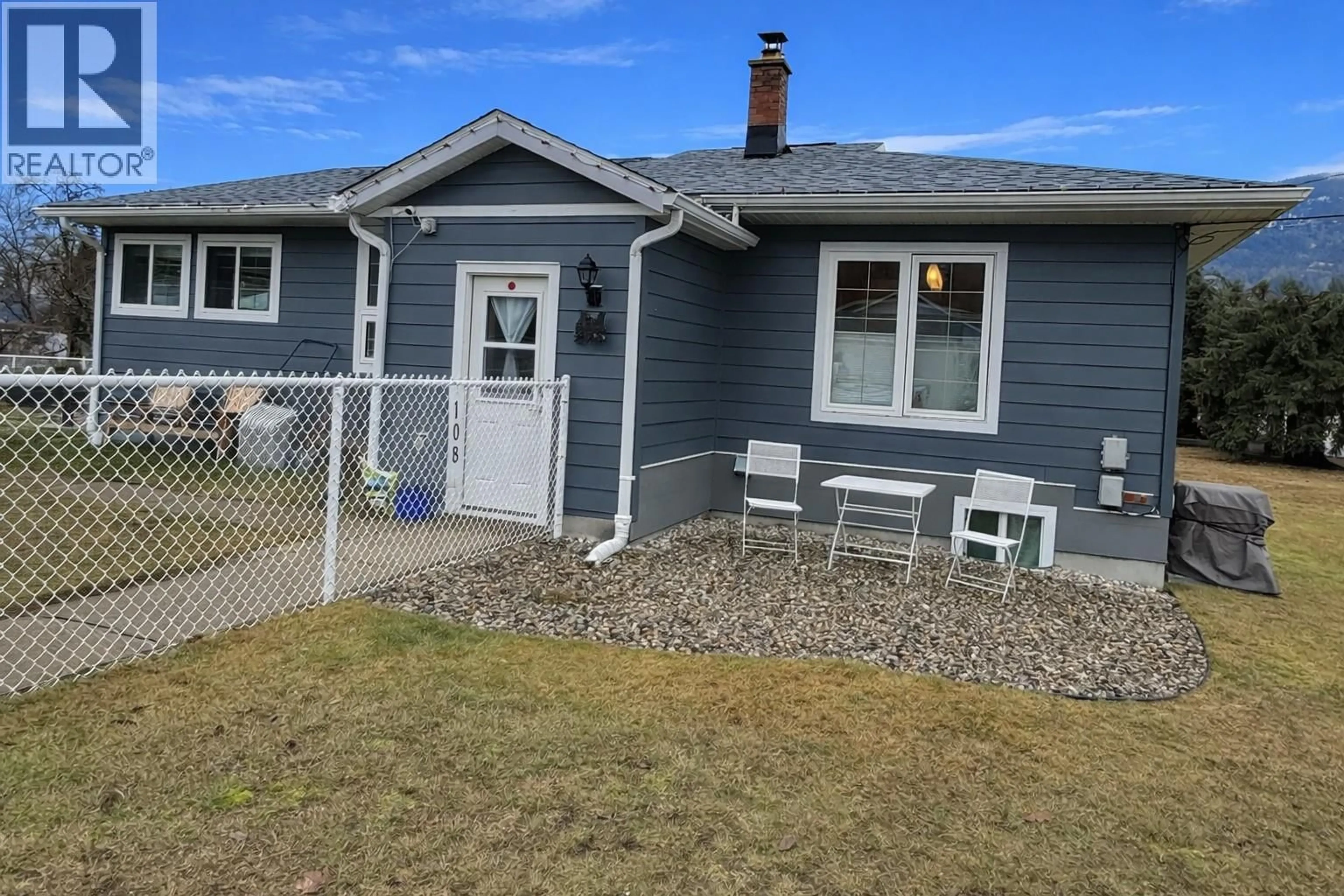 Home with vinyl exterior material, street for 108 101 STREET, Castlegar British Columbia V1N3E4
