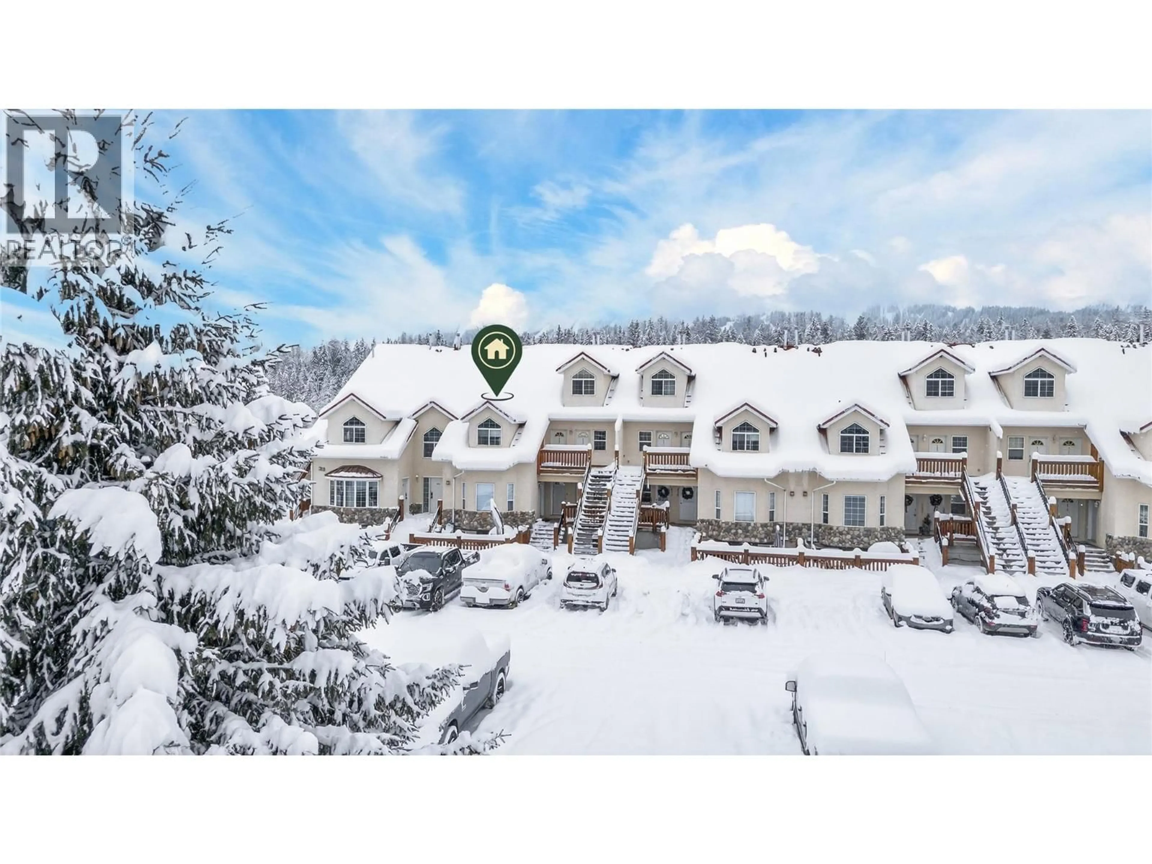 A pic from outside/outdoor area/front of a property/back of a property/a pic from drone, mountain view for 438 - 400 RIVERSIDE WAY, Fernie British Columbia V0B1M7