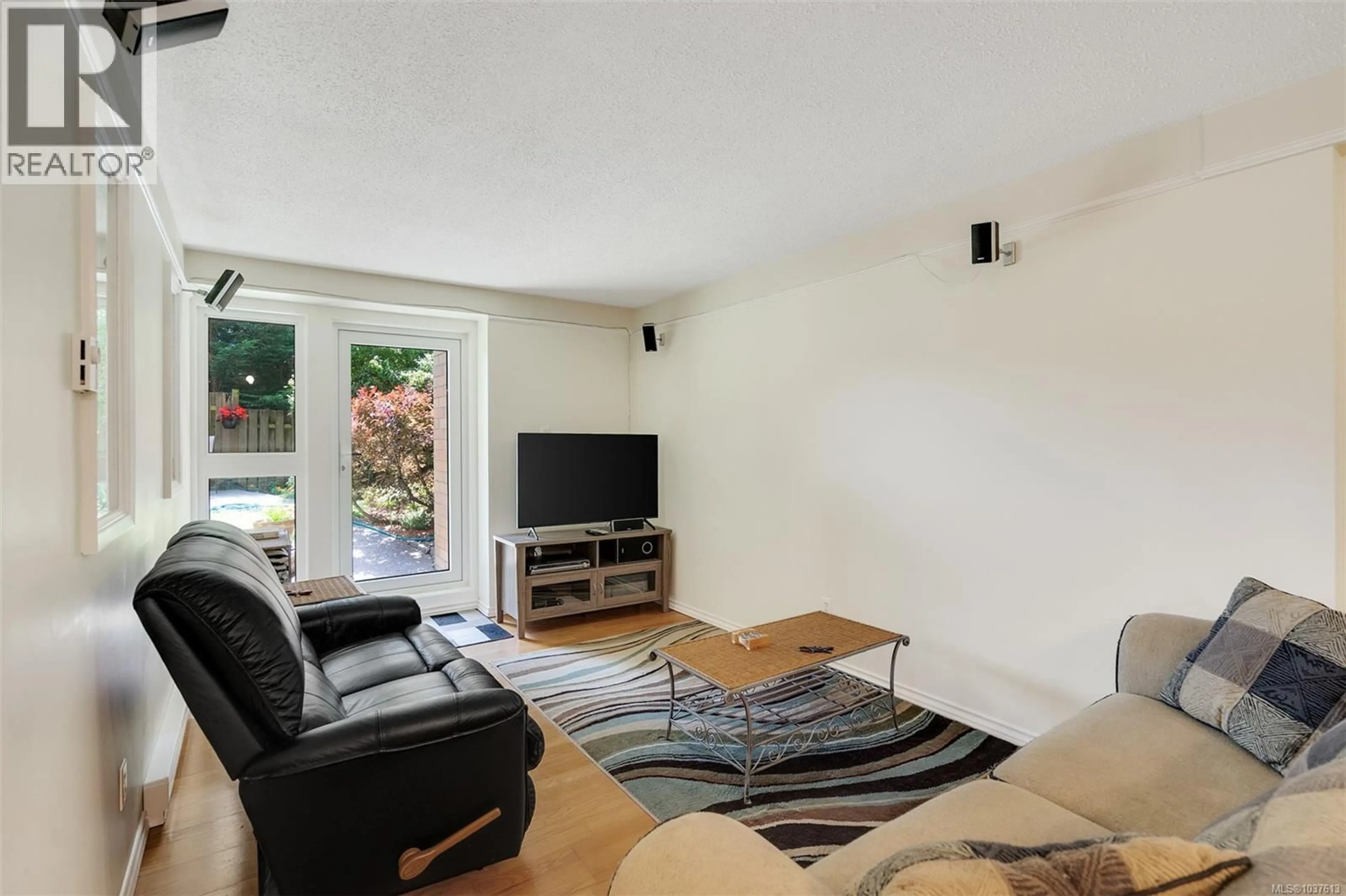 Living room with furniture, unknown for 103 - 4030 QUADRA STREET, Saanich British Columbia V8X1K2