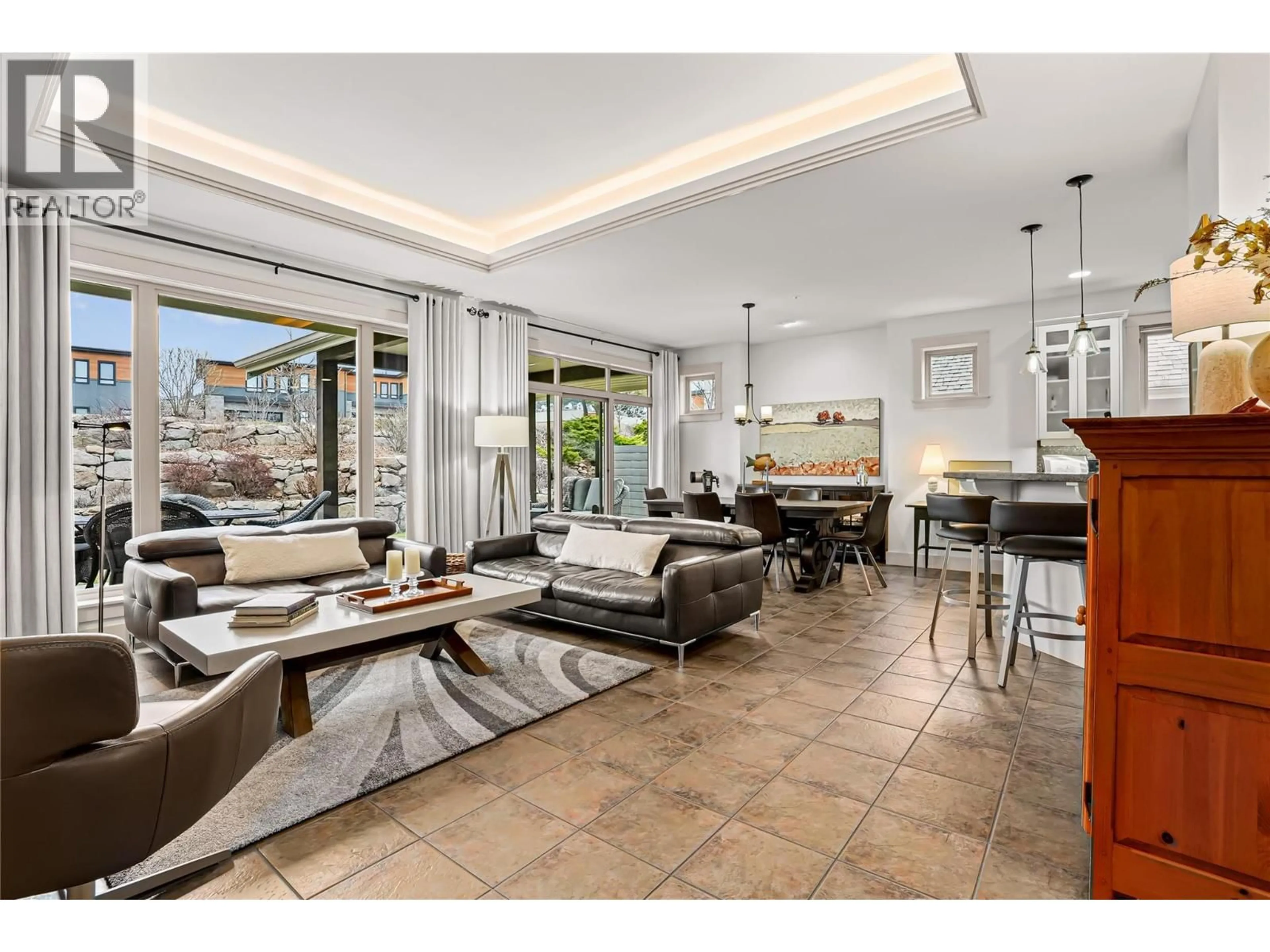 Living room with furniture, ceramic/tile floor for 133 MASHIE CRESCENT, Vernon British Columbia V1H1V8