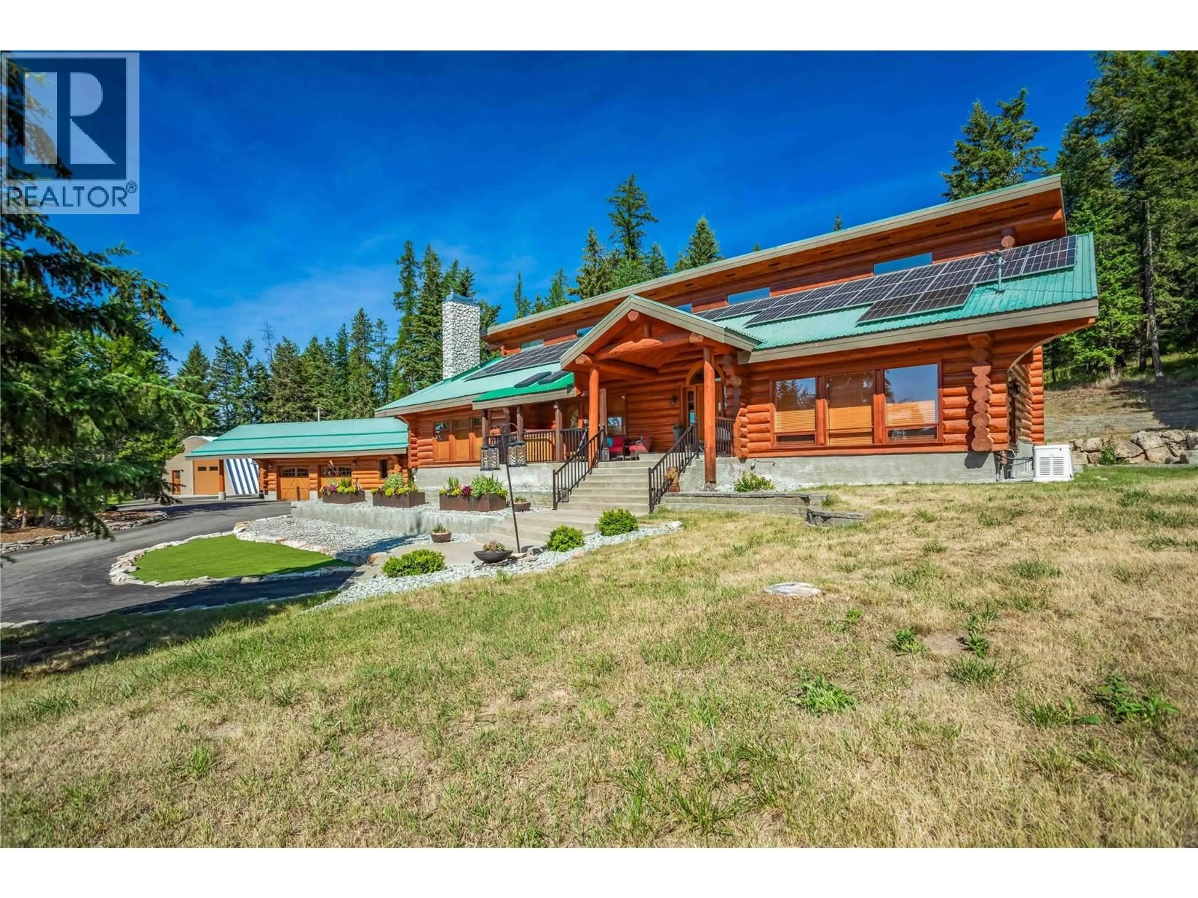 A pic from outside/outdoor area/front of a property/back of a property/a pic from drone, mountain view for 5738 GOUDIE ROAD, Kelowna British Columbia V1P1M4