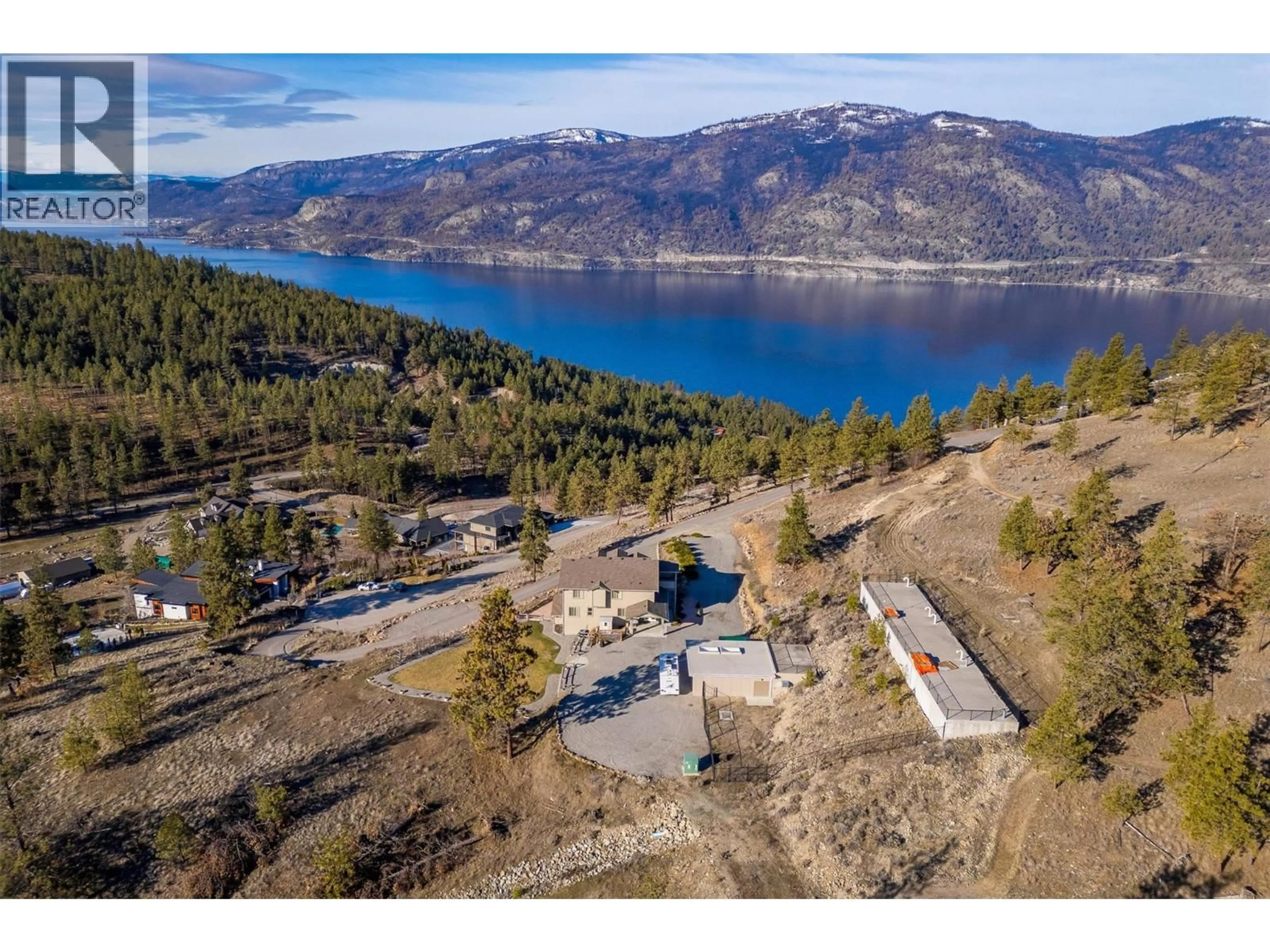 A pic from outside/outdoor area/front of a property/back of a property/a pic from drone, water/lake/river/ocean view for 1788 SHAYLER PLACE, Kelowna British Columbia V1V2R1