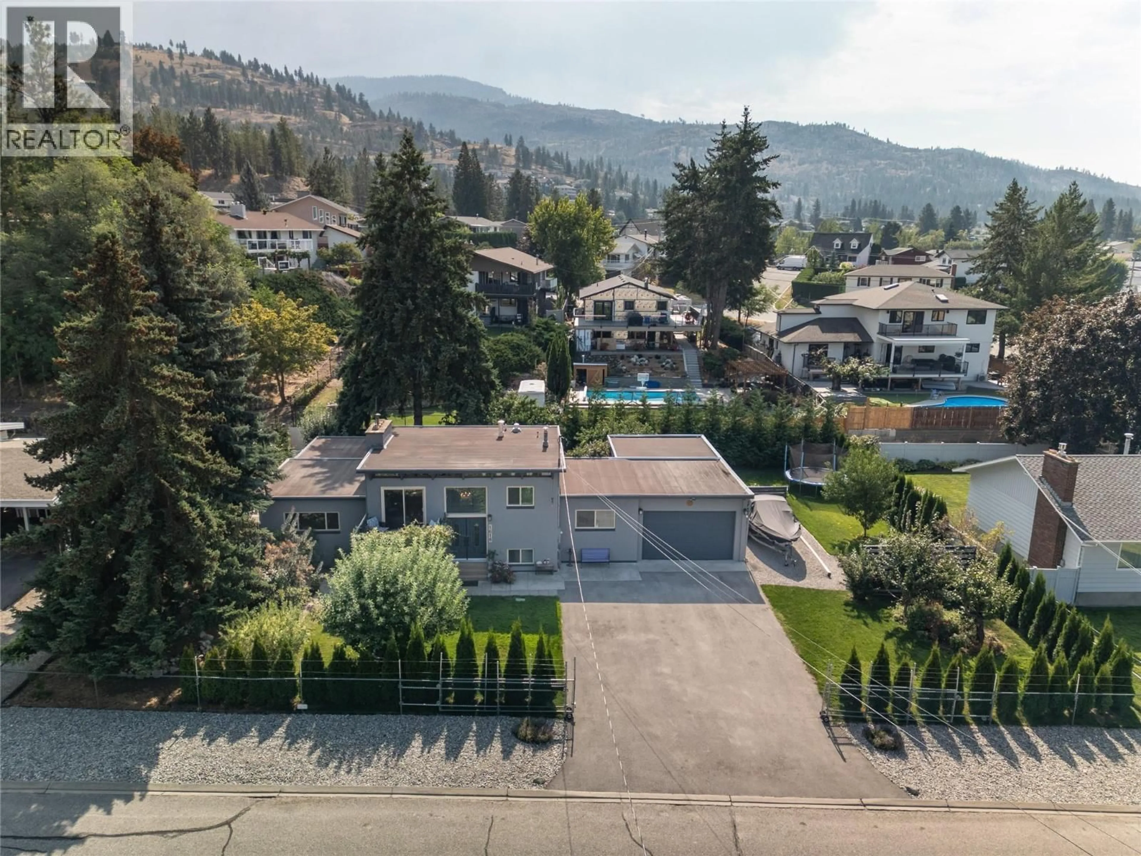 A pic from outside/outdoor area/front of a property/back of a property/a pic from drone, mountain view for 1618 DUNCAN AVE E AVENUE, Penticton British Columbia V2A2X9