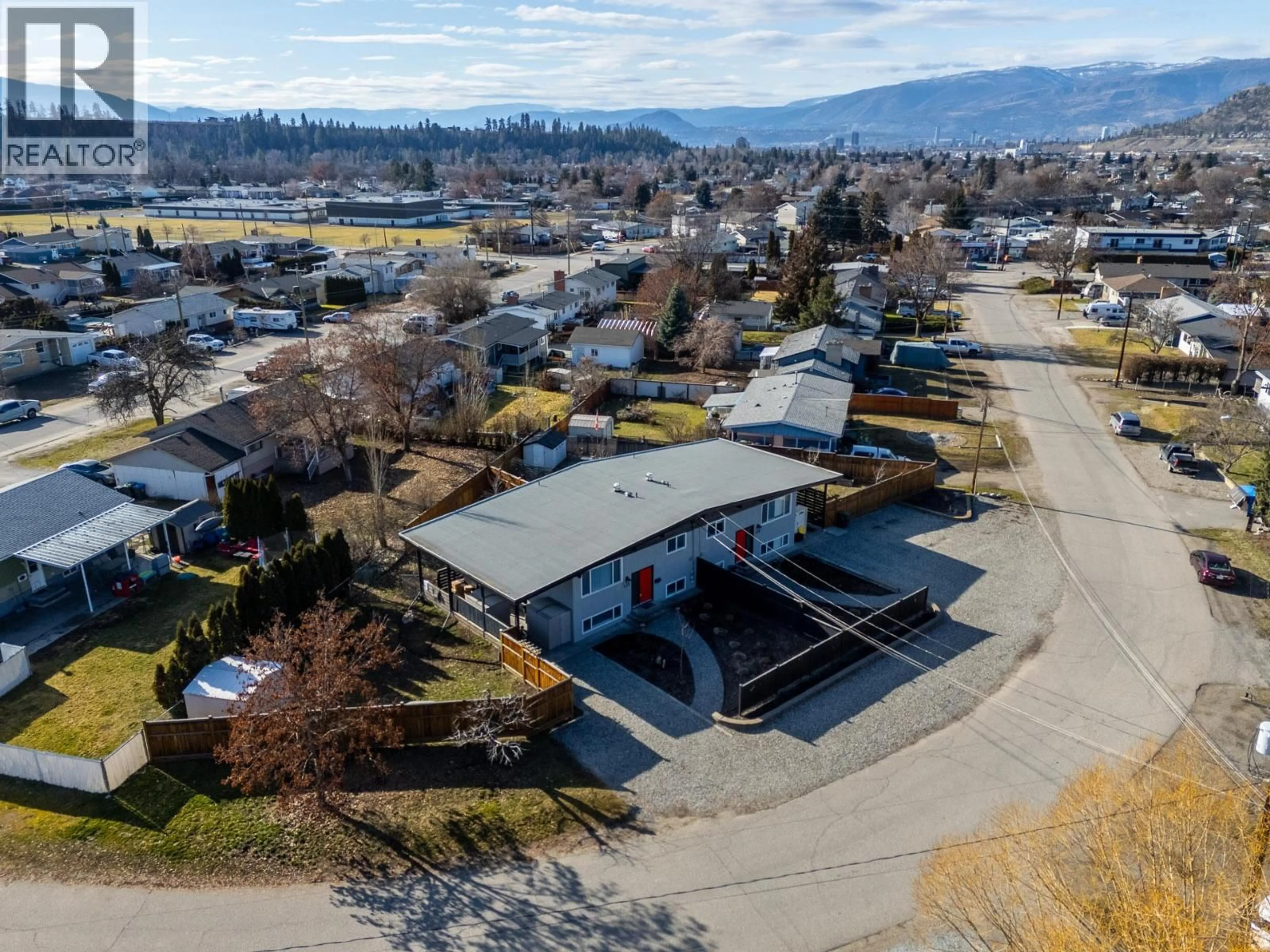 A pic from outside/outdoor area/front of a property/back of a property/a pic from drone, mountain view for 525B JASCHINSKY ROAD, Kelowna British Columbia V1X1L9