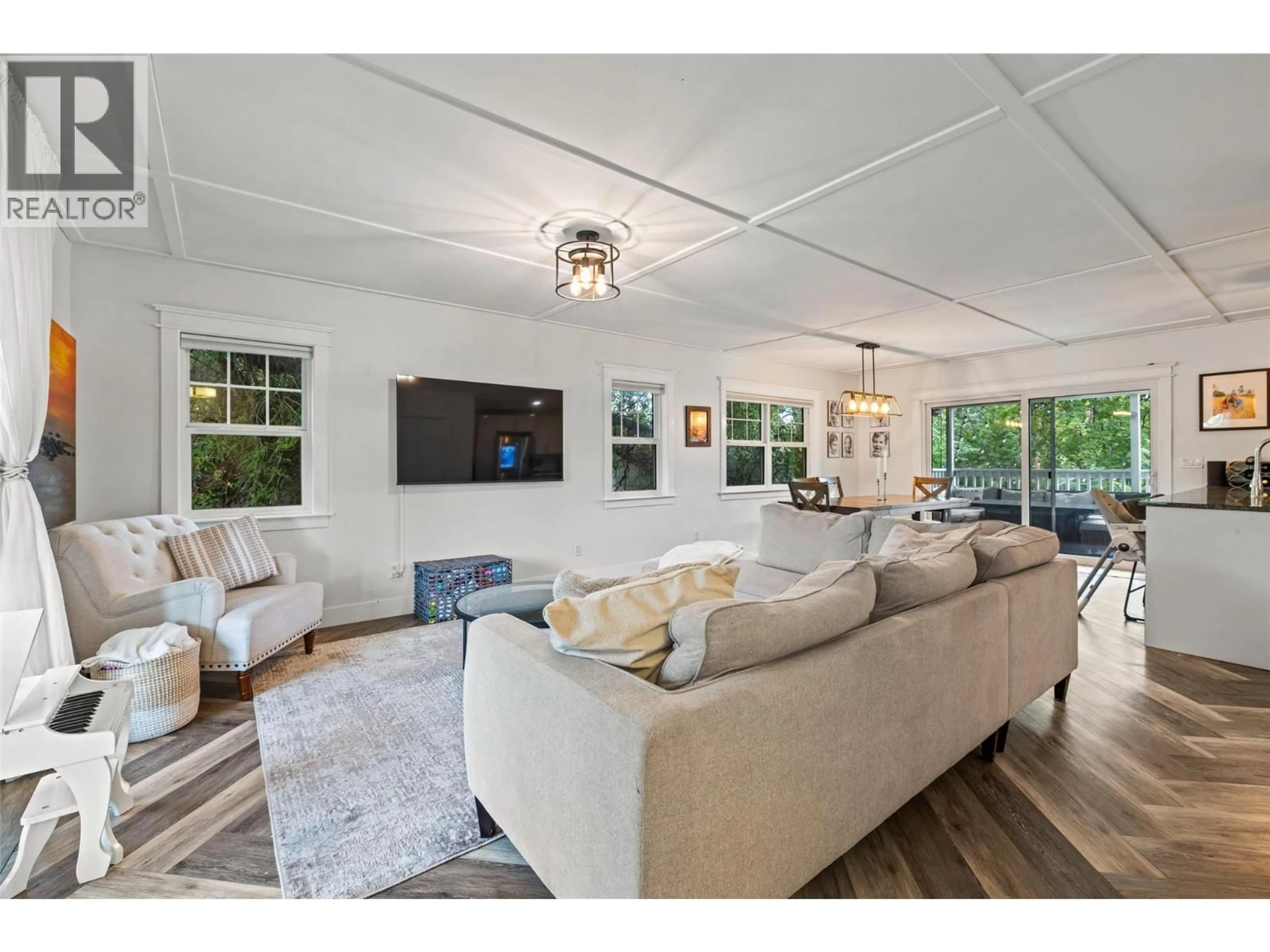 Living room with furniture, unknown for 4382 GORDON DRIVE, Kelowna British Columbia V1W1S8