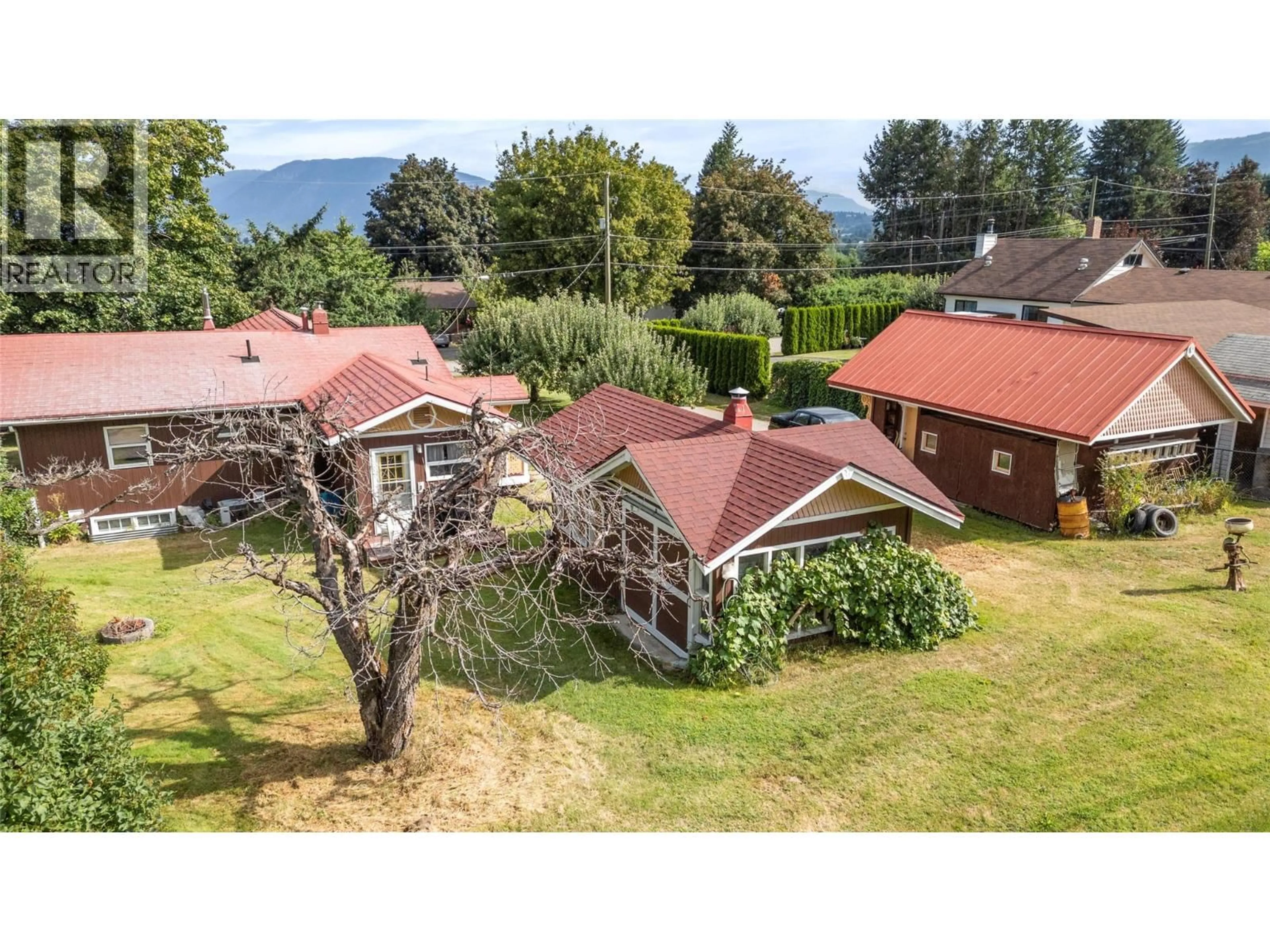 A pic from outside/outdoor area/front of a property/back of a property/a pic from drone, mountain view for 1080 20 AVENUE SOUTHWEST, Salmon Arm British Columbia V1E1L6
