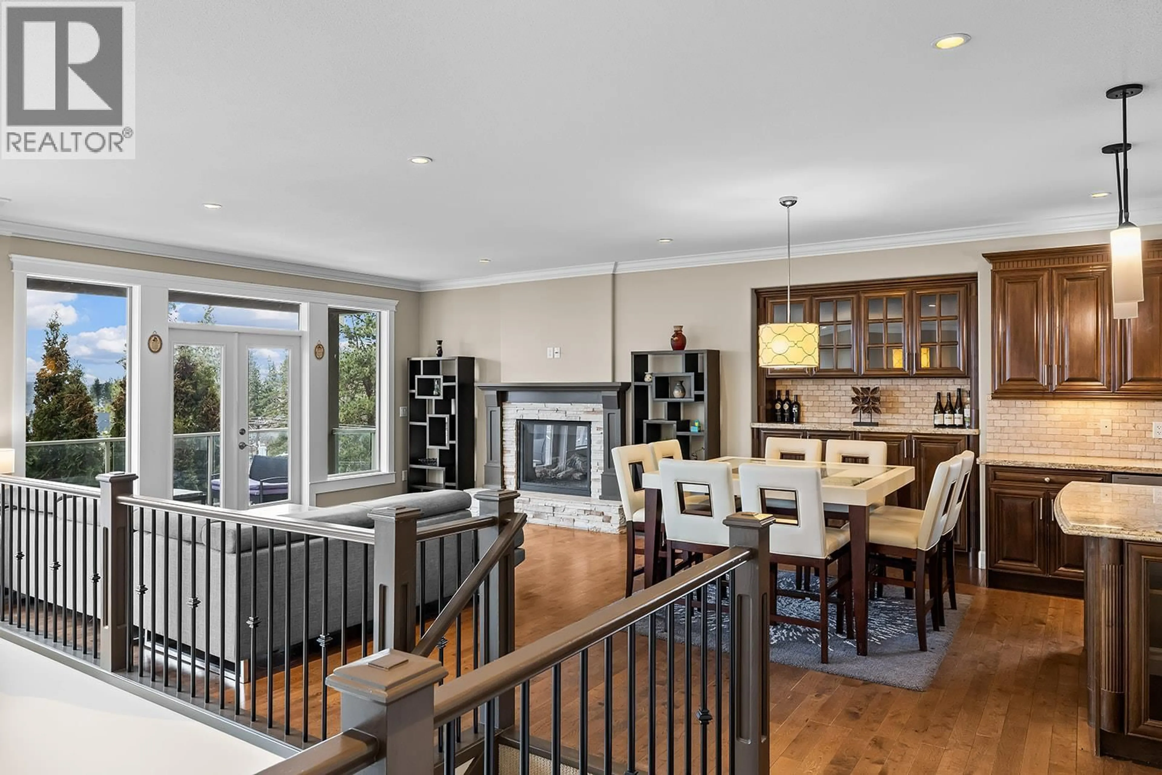 Open concept kitchen, wood/laminate floor for 368 TRUMPETER COURT, Kelowna British Columbia V1W5J4