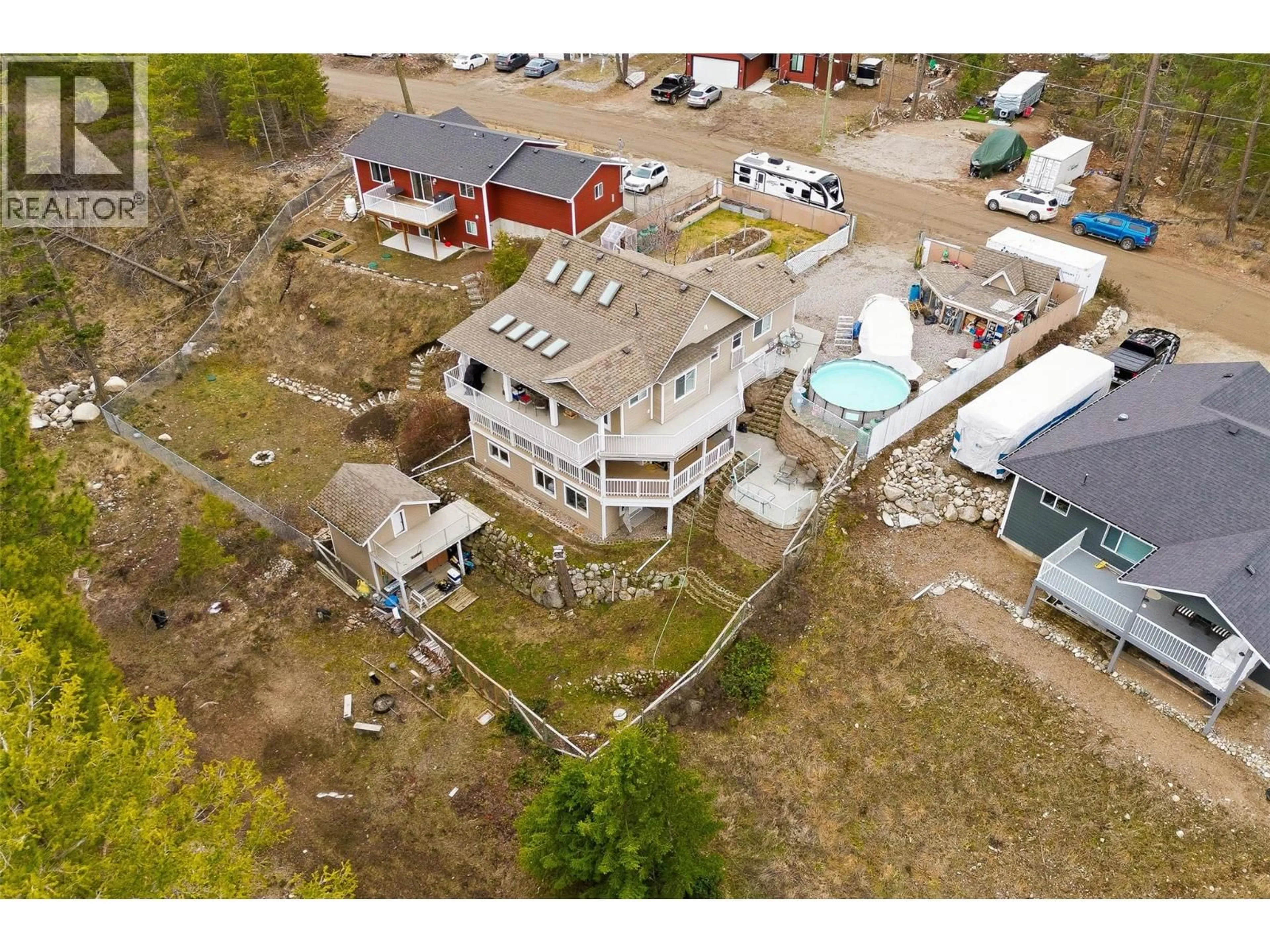 A pic from outside/outdoor area/front of a property/back of a property/a pic from drone, building for 674 MUIR ROAD, Kelowna British Columbia V1Z3W2