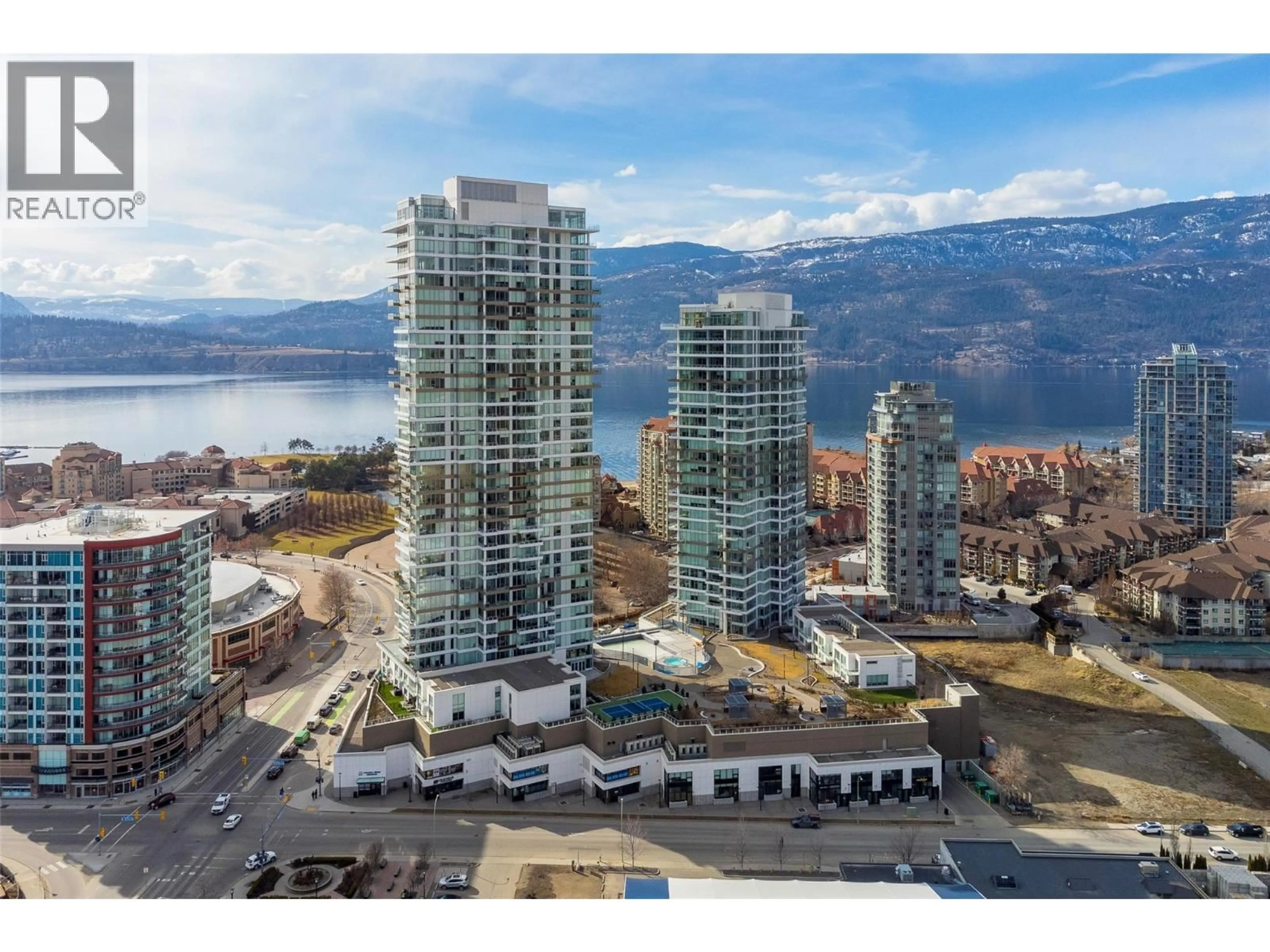 A pic from outside/outdoor area/front of a property/back of a property/a pic from drone, water/lake/river/ocean view for 2202 - 1191 SUNSET DRIVE, Kelowna British Columbia V1Y0J4
